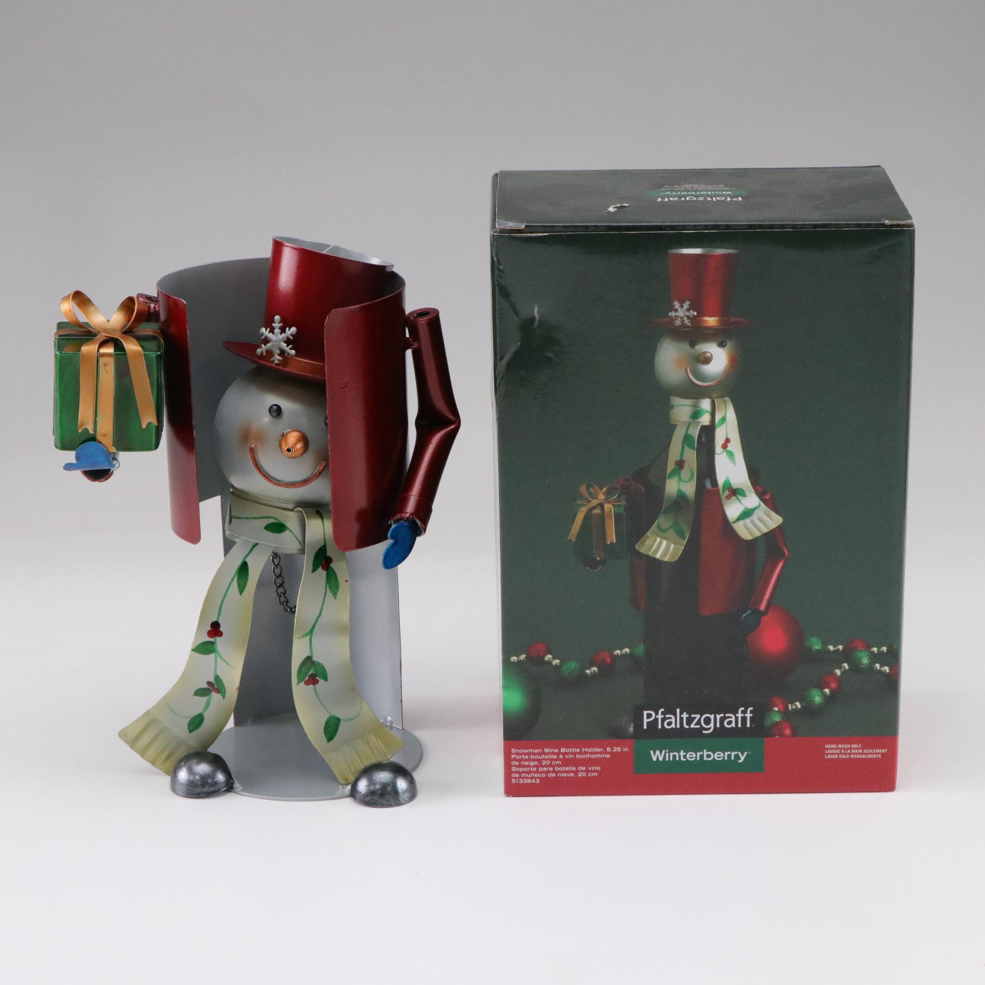 Metal Snowman Wine Bottle Holder, Reindeer Wall Hanging, & Ceramic Santa Plates