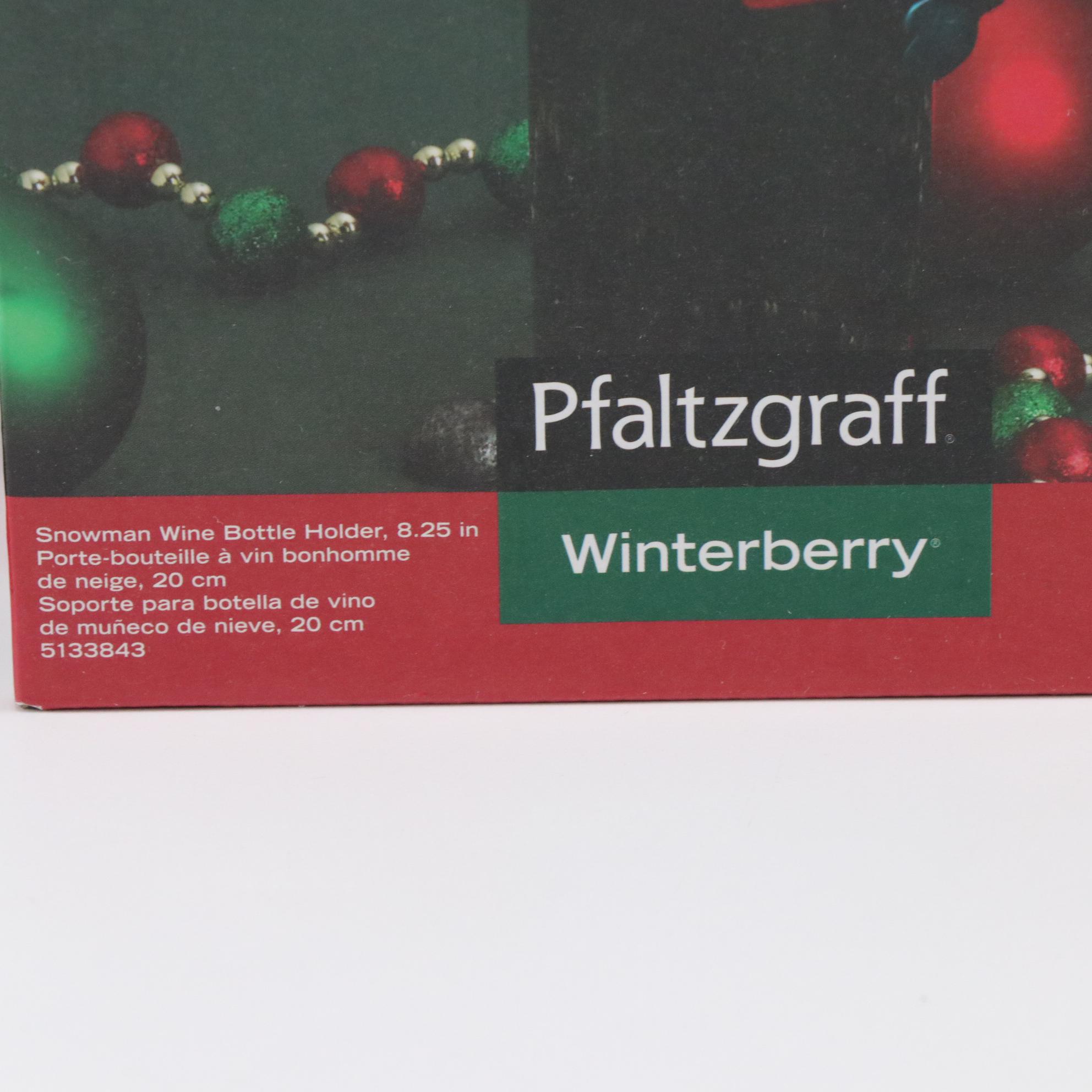 Metal Snowman Wine Bottle Holder, Reindeer Wall Hanging, & Ceramic Santa Plates