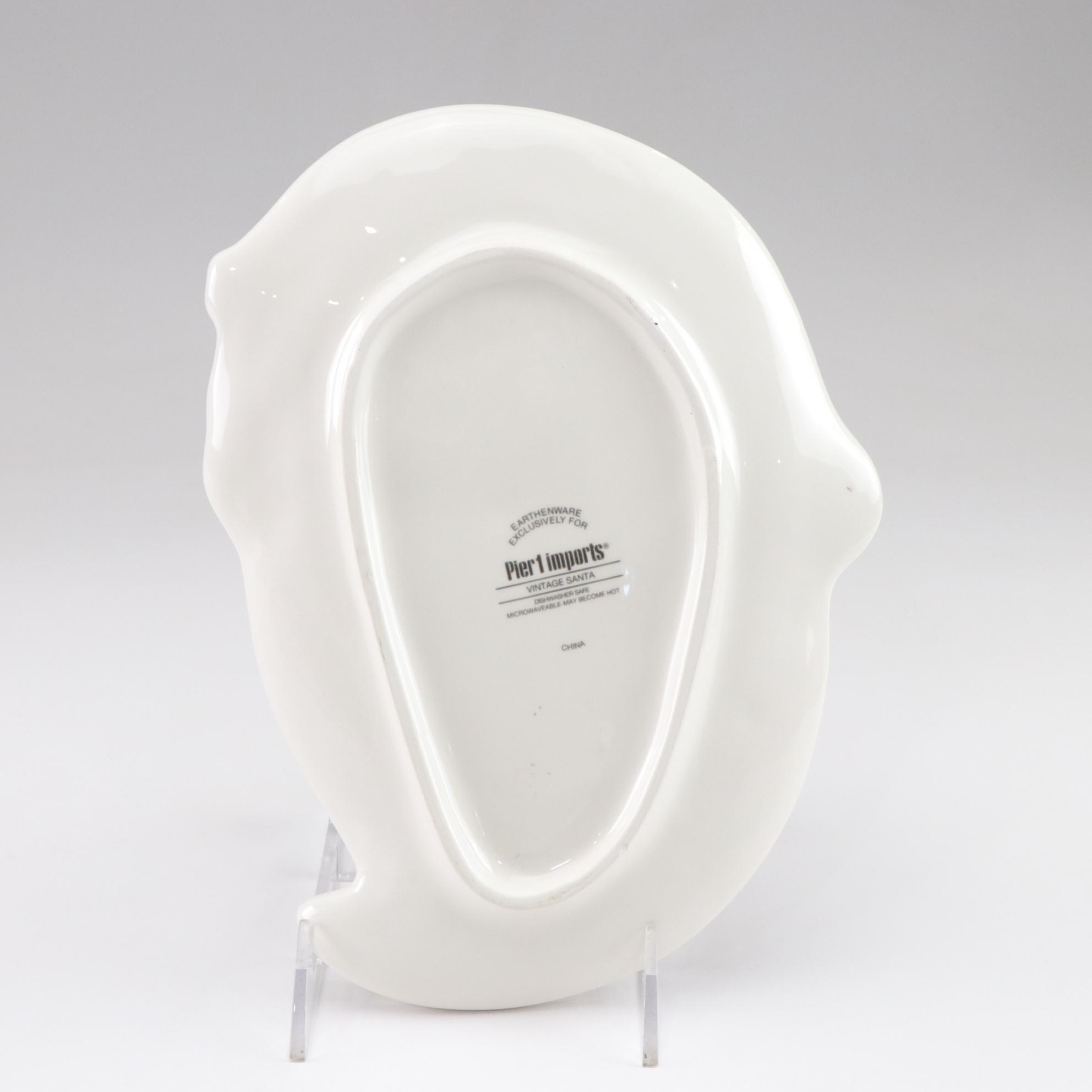 Metal Snowman Wine Bottle Holder, Reindeer Wall Hanging, & Ceramic Santa Plates