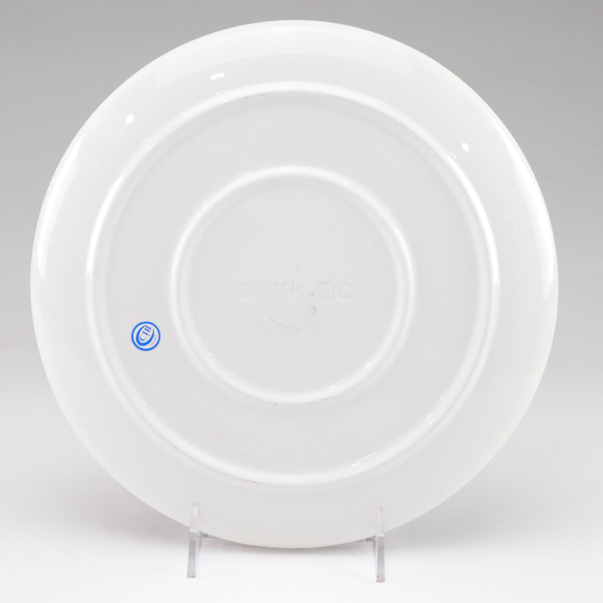 Metal Snowman Wine Bottle Holder, Reindeer Wall Hanging, & Ceramic Santa Plates