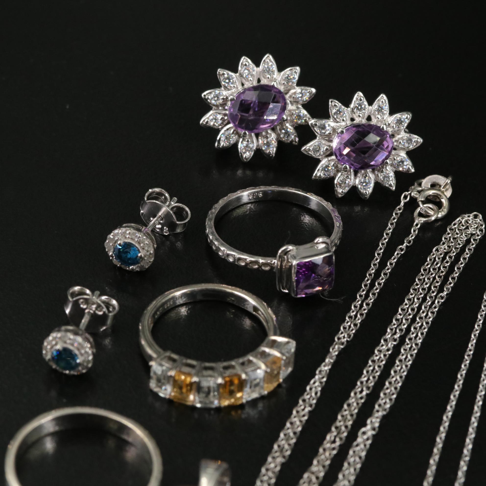 Group of 14 Assorted Sterling Silver Rings, Necklaces, Earrings, and Pendants