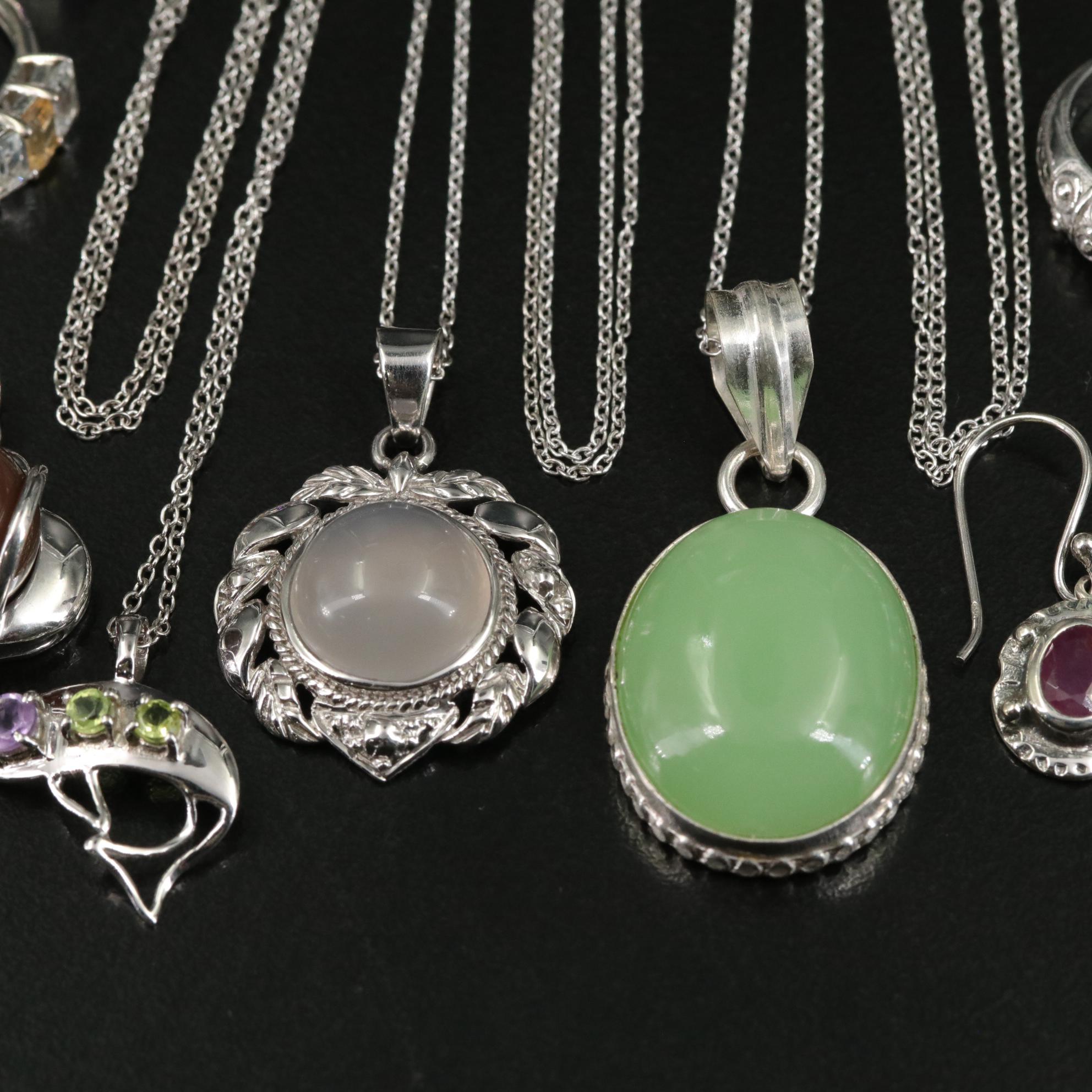 Group of 14 Assorted Sterling Silver Rings, Necklaces, Earrings, and Pendants