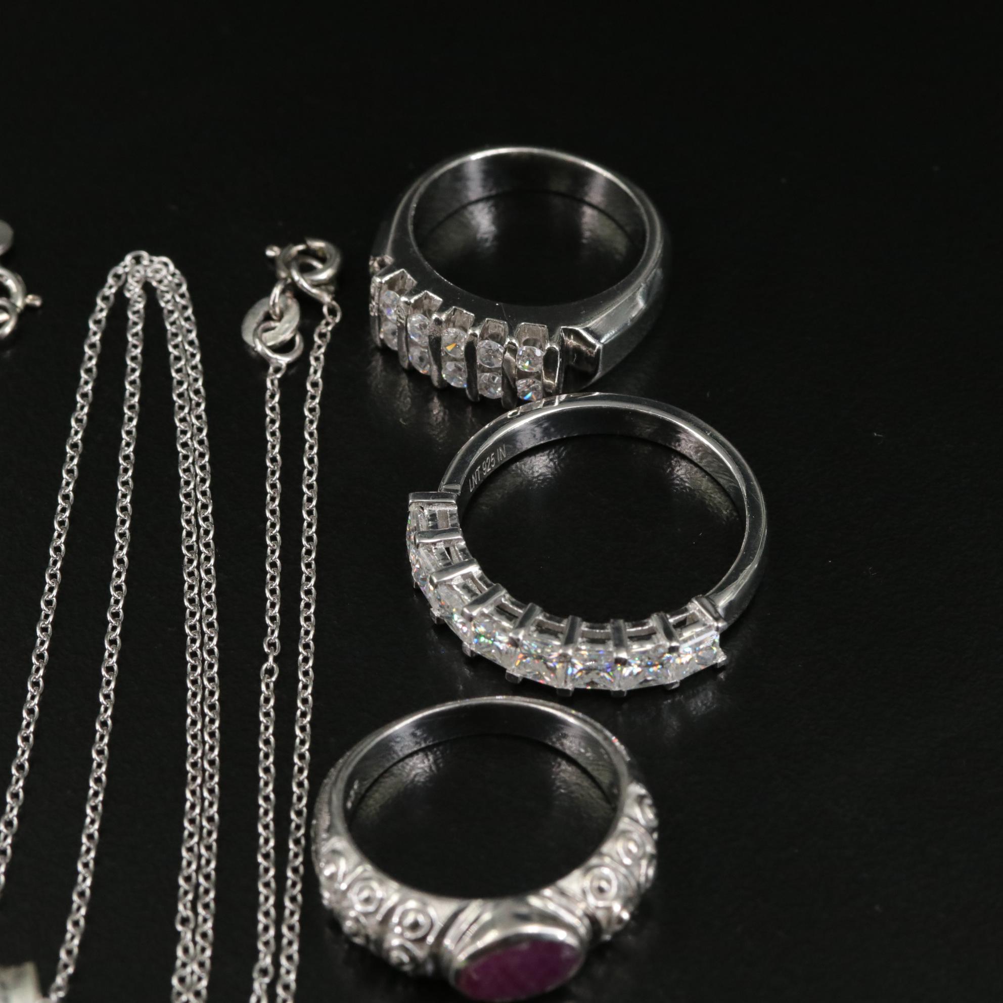 Group of 14 Assorted Sterling Silver Rings, Necklaces, Earrings, and Pendants