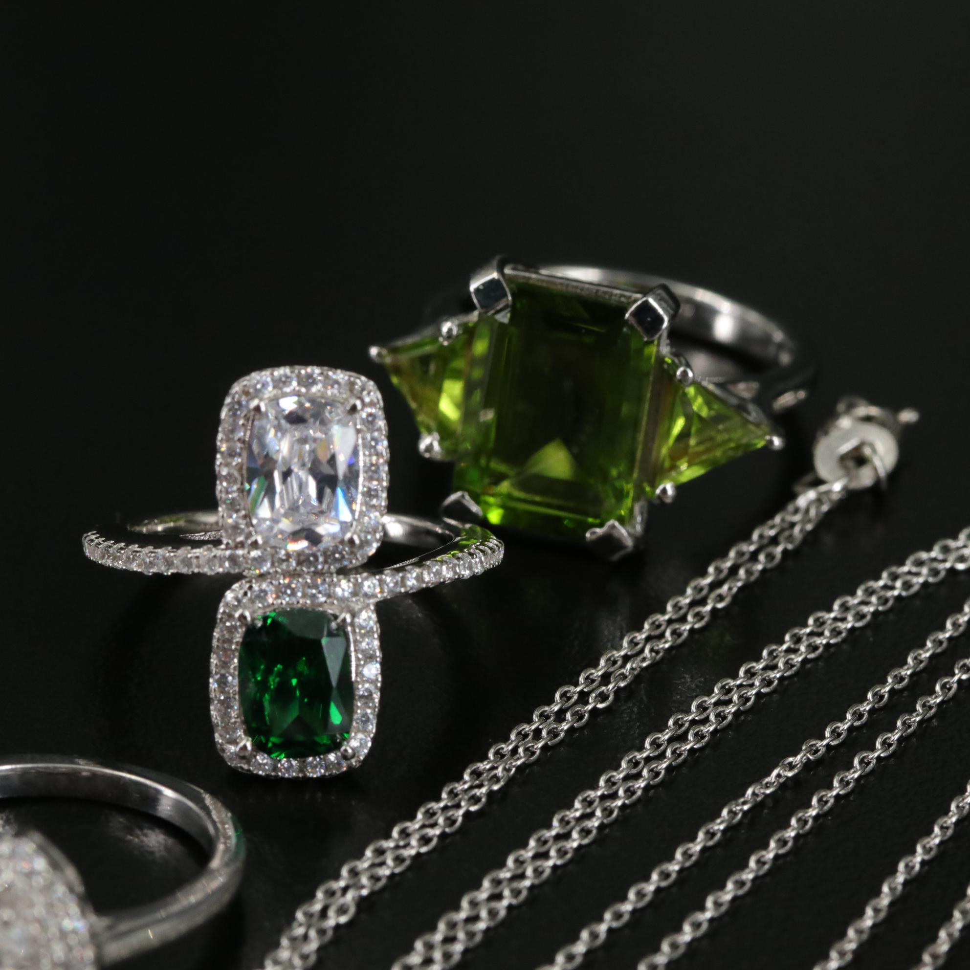 Group of 14 Assorted Sterling Silver Rings, Necklaces, Earrings, and Pendants