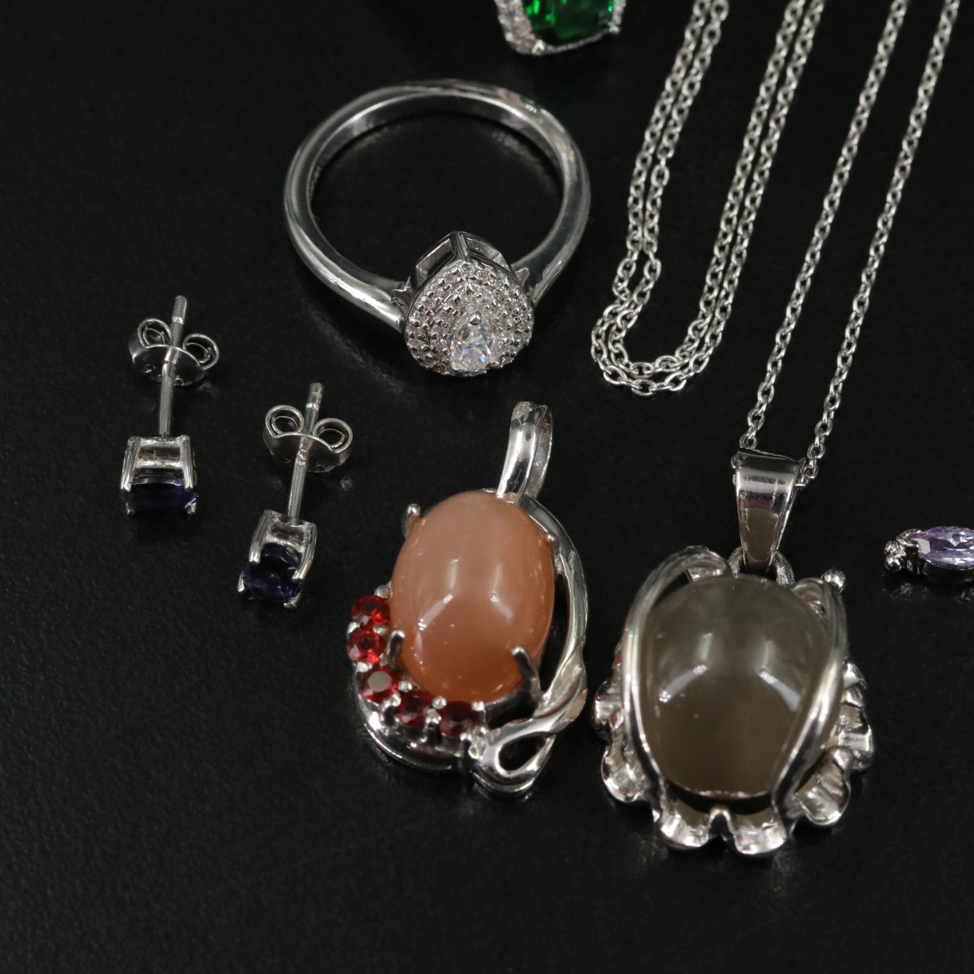 Group of 14 Assorted Sterling Silver Rings, Necklaces, Earrings, and Pendants