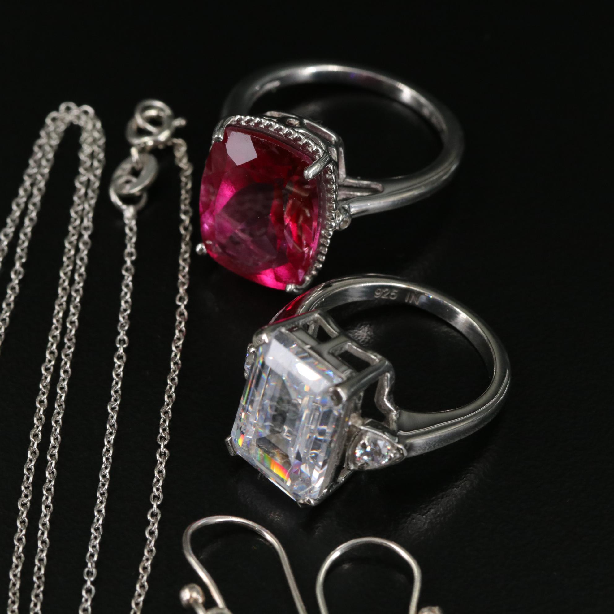 Group of 14 Assorted Sterling Silver Rings, Necklaces, Earrings, and Pendants