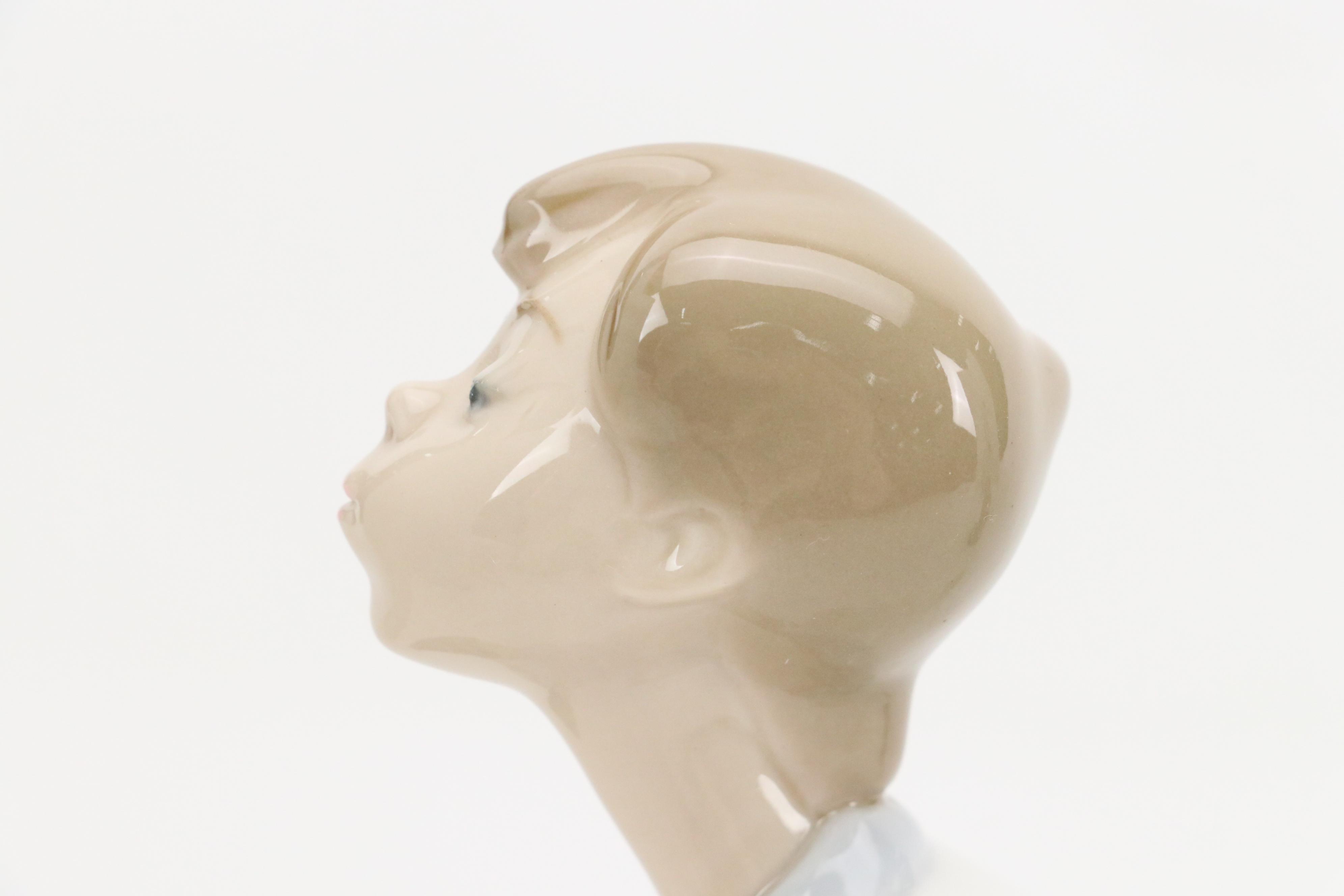 Lladró "Over the Threshold" "Boy Blowing Kiss" and More Porcelain Figurines