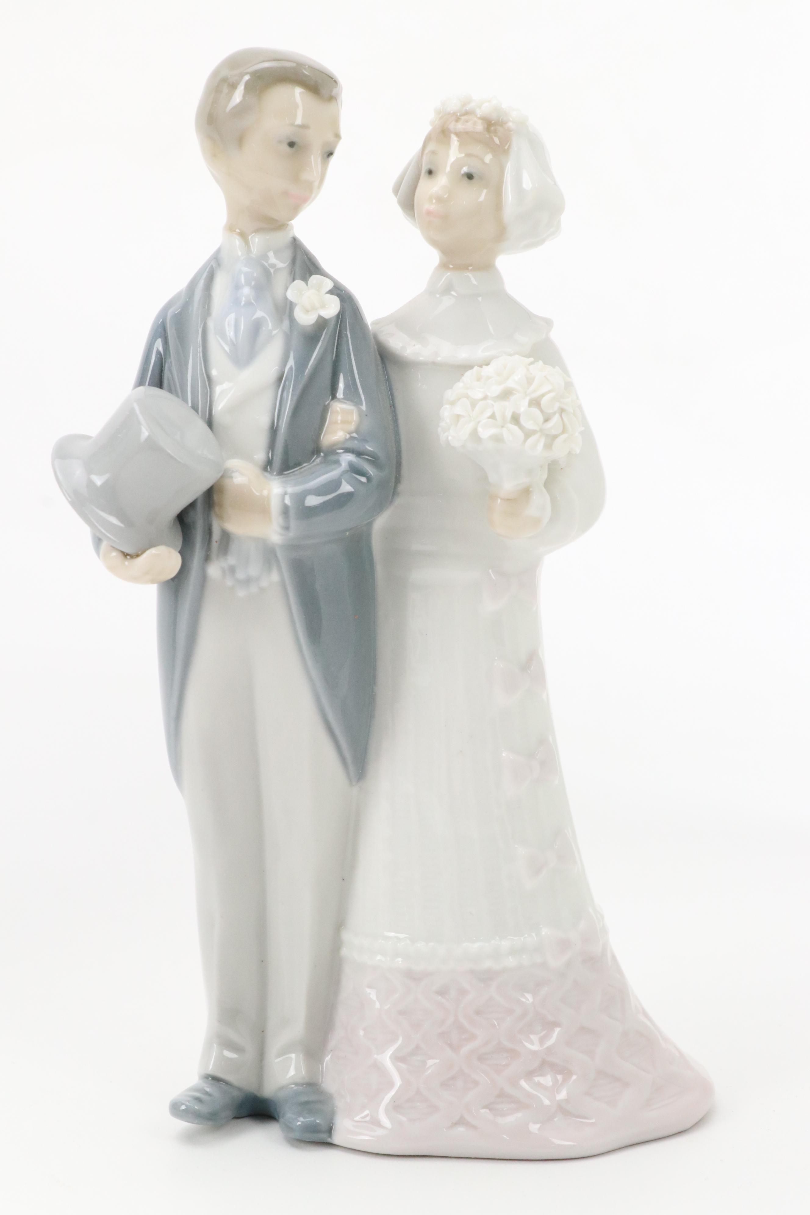 Lladró "Over the Threshold" "Boy Blowing Kiss" and More Porcelain Figurines