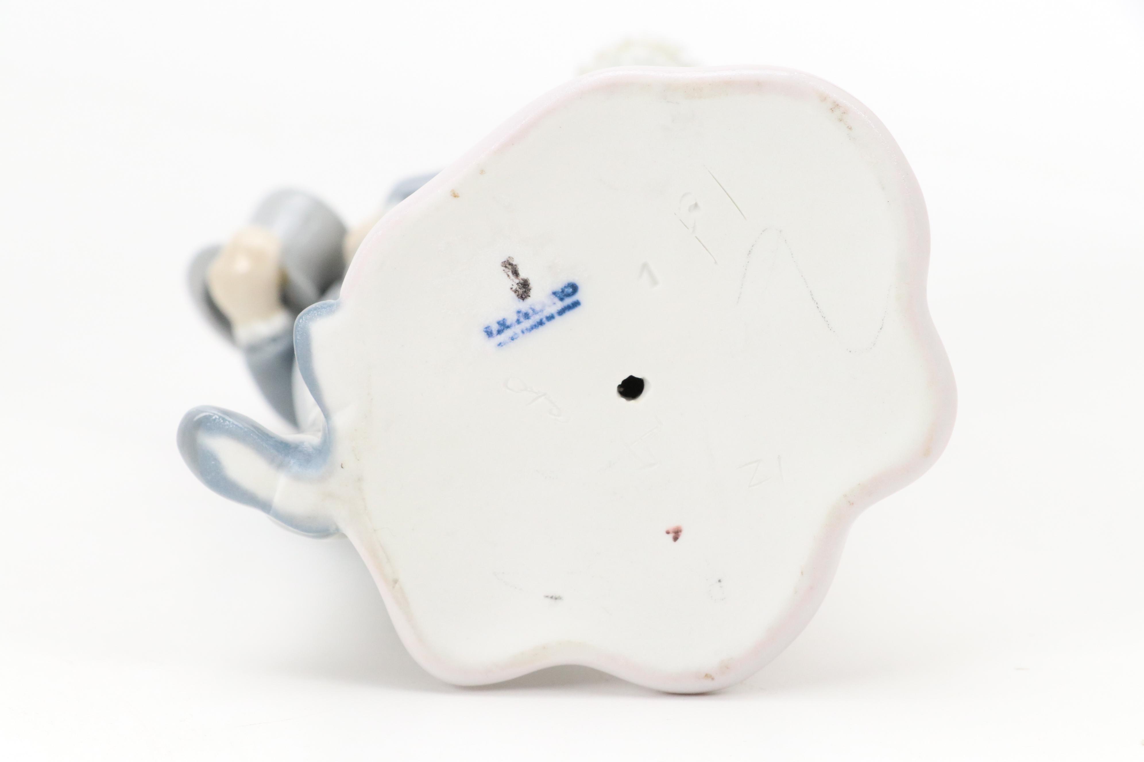 Lladró "Over the Threshold" "Boy Blowing Kiss" and More Porcelain Figurines