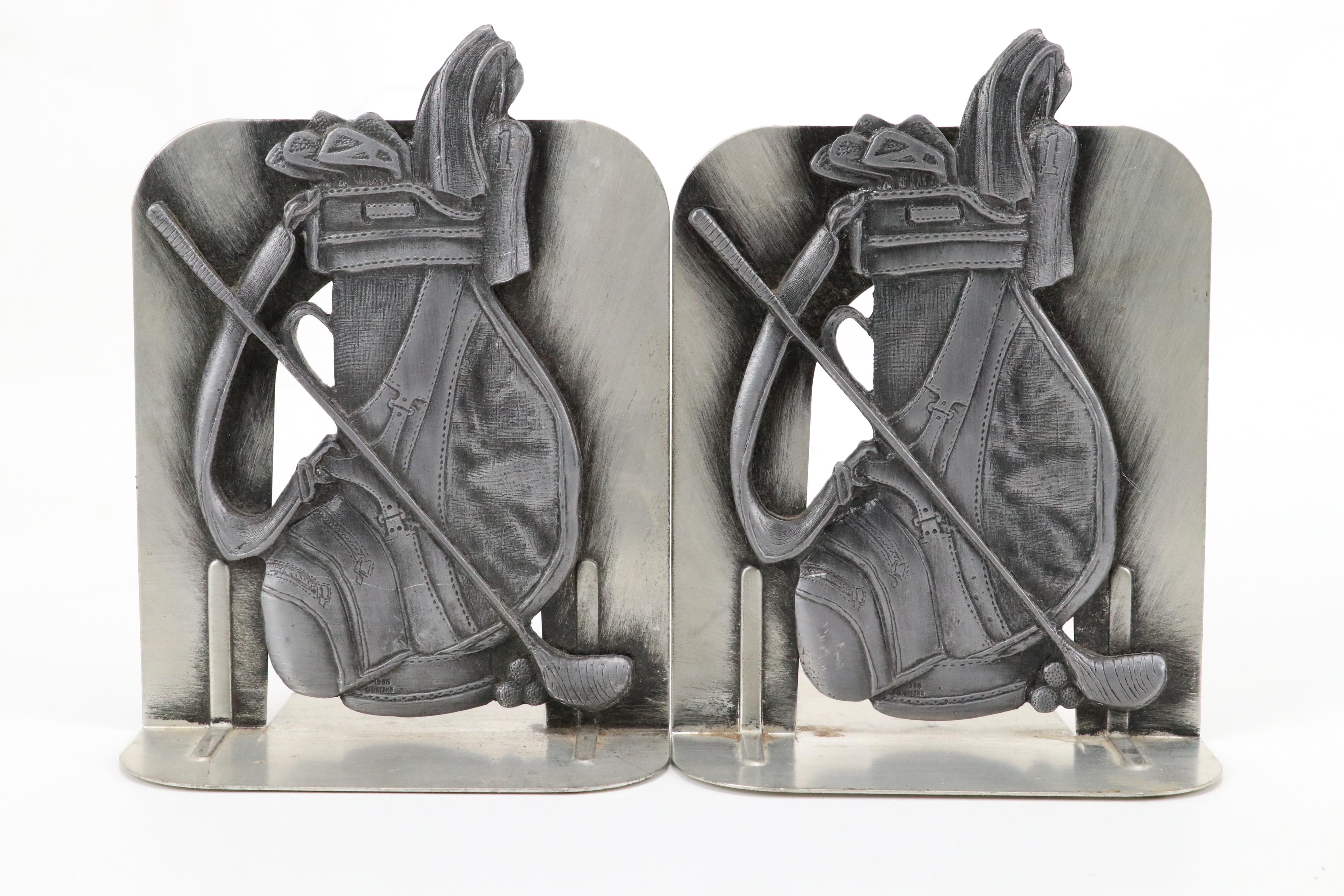 Cast Iron Sundial, Golfer Bookend and Pair of Golf Bag Bookends