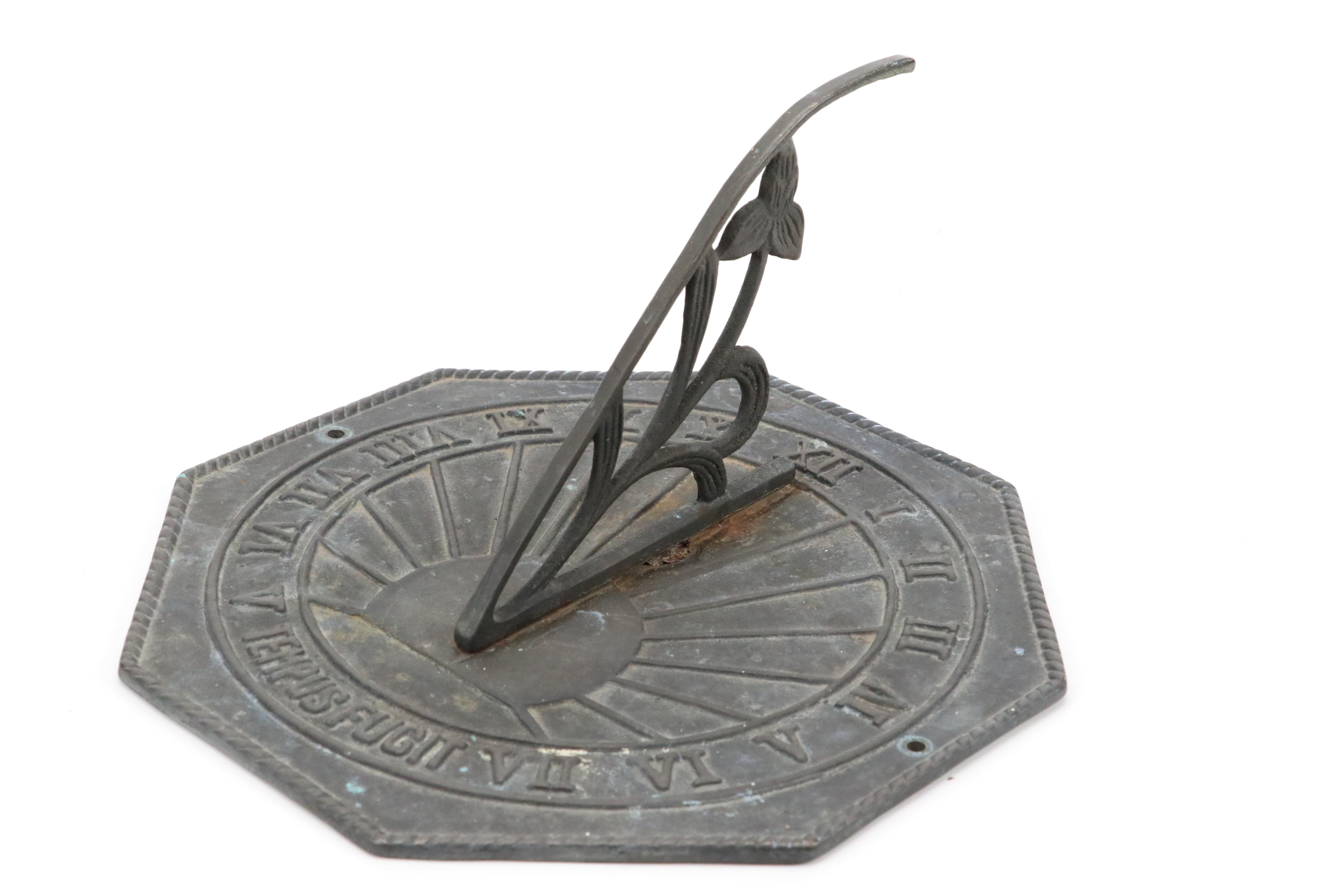 Cast Iron Sundial, Golfer Bookend and Pair of Golf Bag Bookends