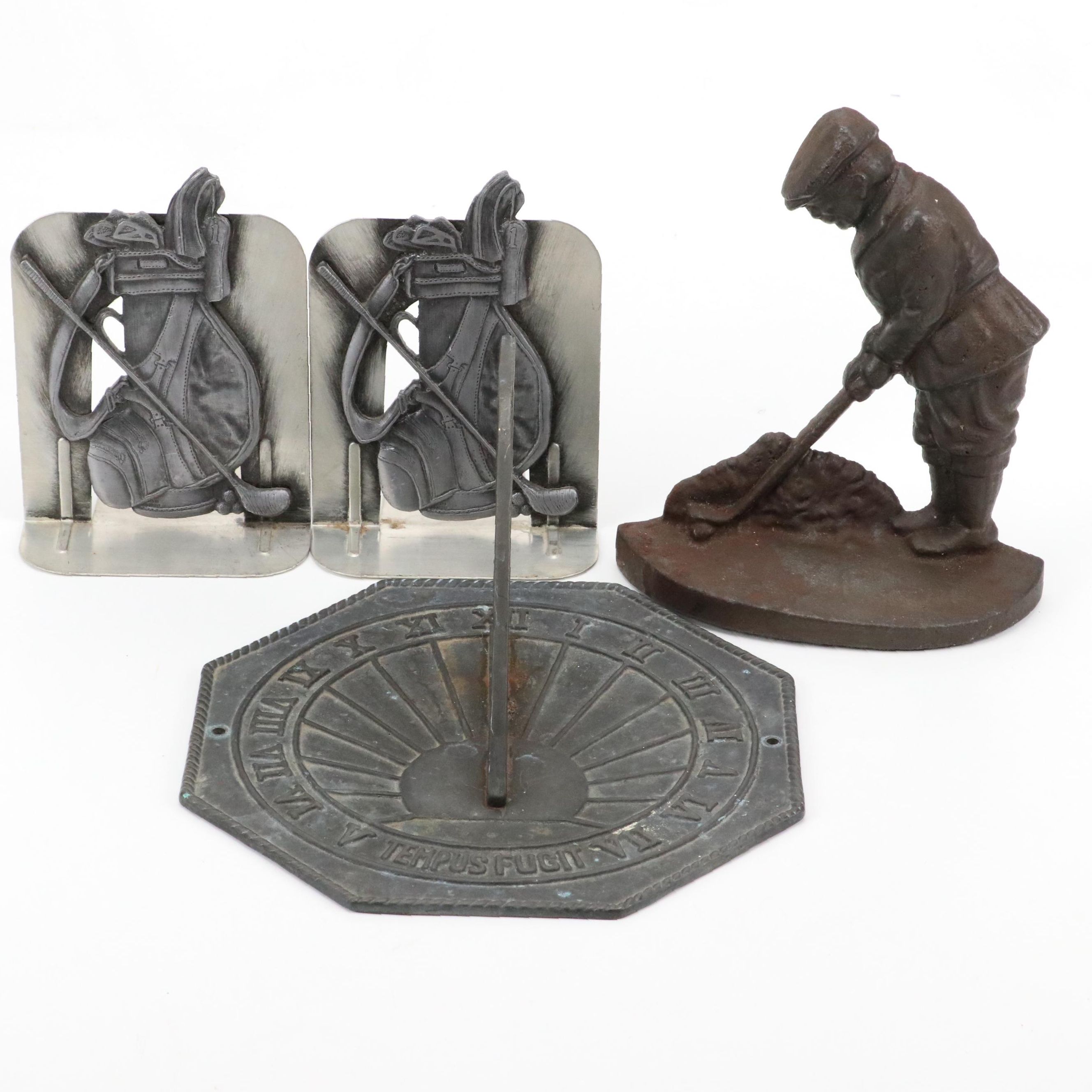 Cast Iron Sundial, Golfer Bookend and Pair of Golf Bag Bookends
