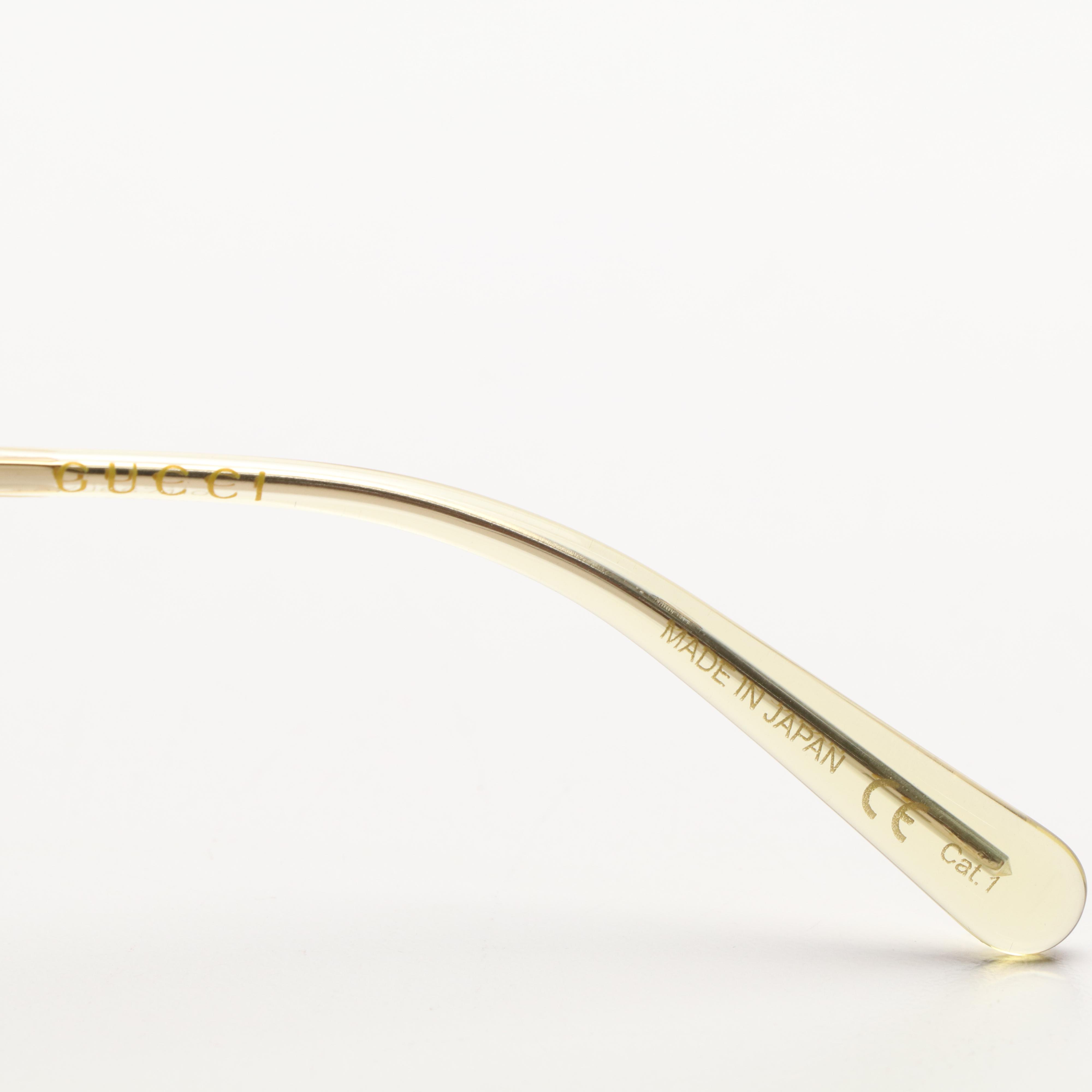 Gucci GG1282SA Gold Tone Frame and Yellow Tint Sunglasses with Case