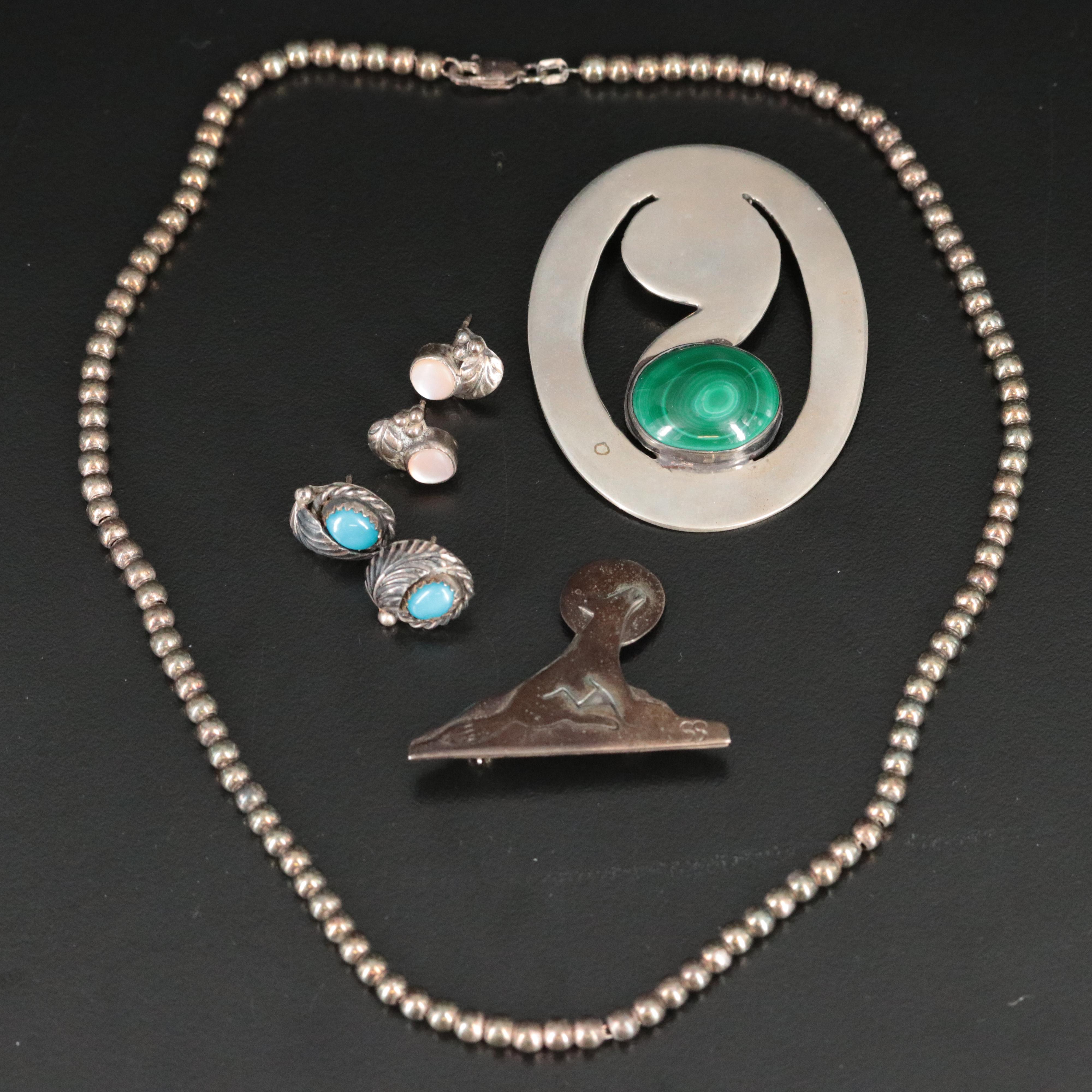 Sterling and Malachite Featured in Jewelry Collection