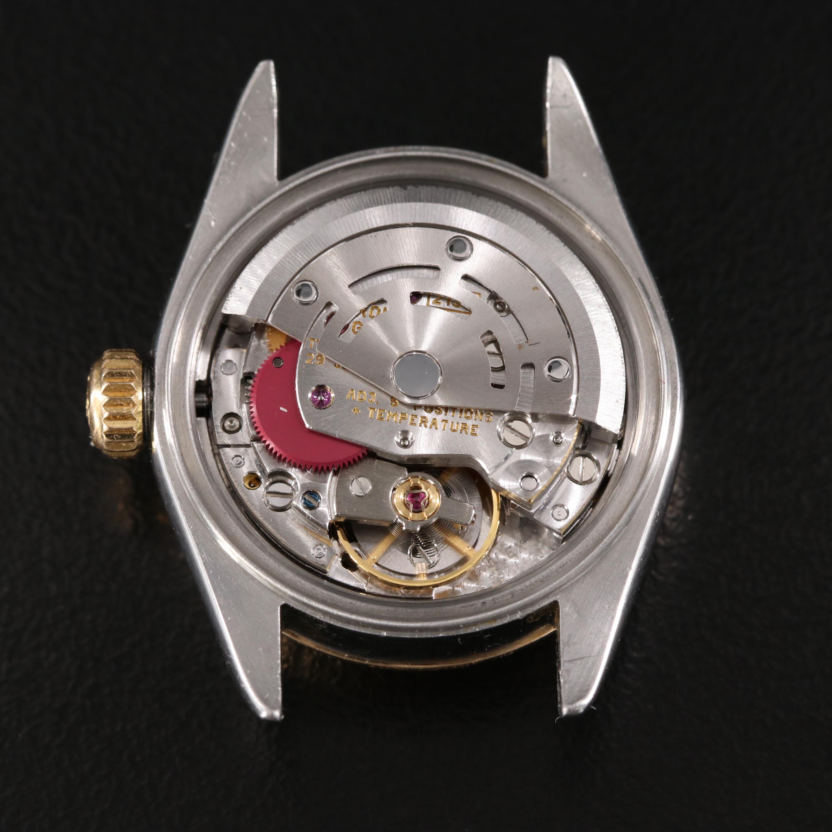 1998 Rolex Ivory Pyramid Roman Dial Datejust 69173 Watch