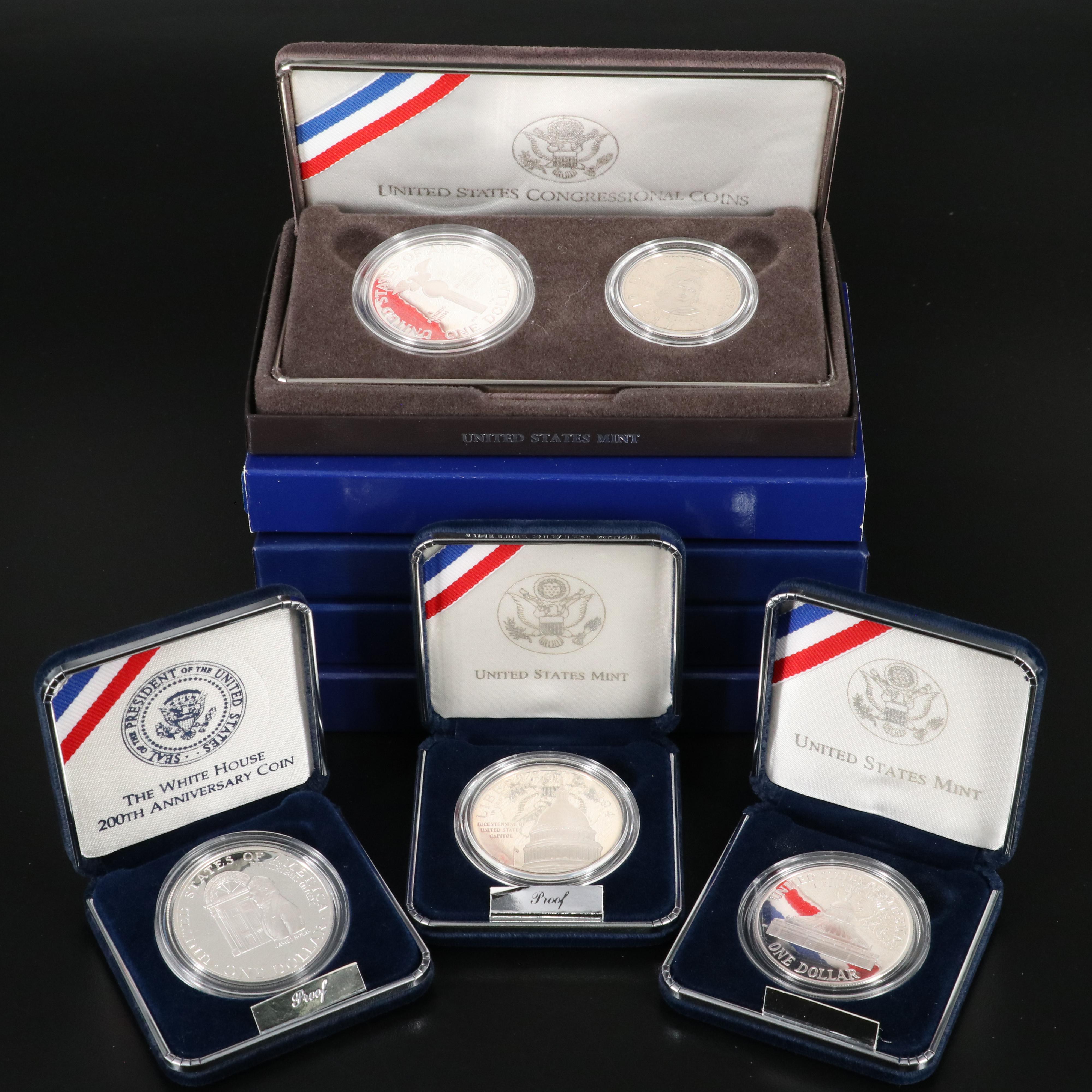 Eight Modern Commemorative Silver Dollars and Four Clad Half Dollars
