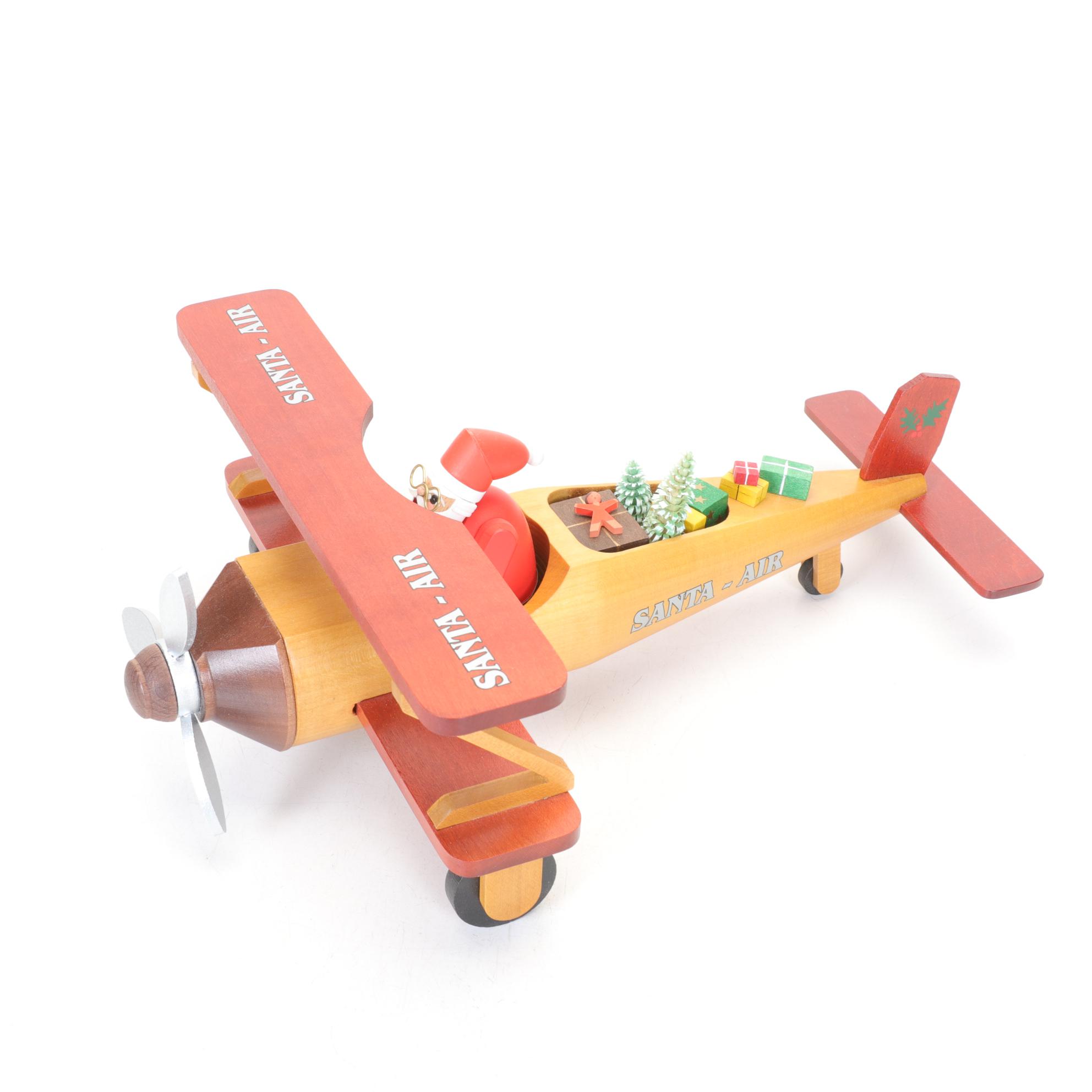 Richard Glasser Erzgebirgische German Carved Wood Santa in Biplane Figurine
