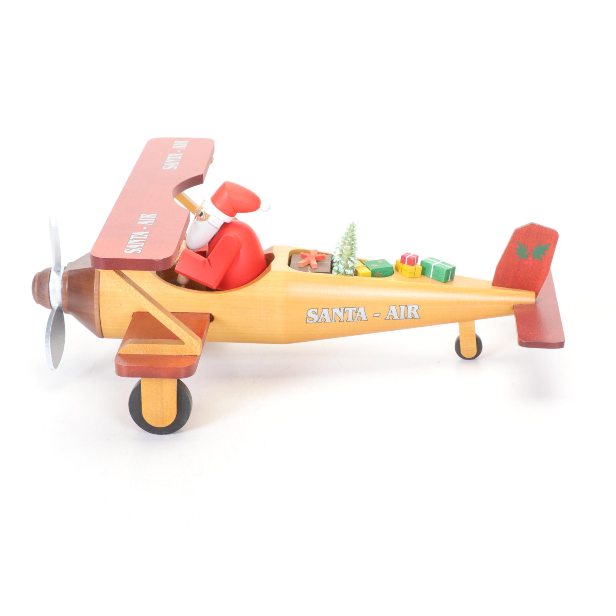 Richard Glasser Erzgebirgische German Carved Wood Santa in Biplane Figurine