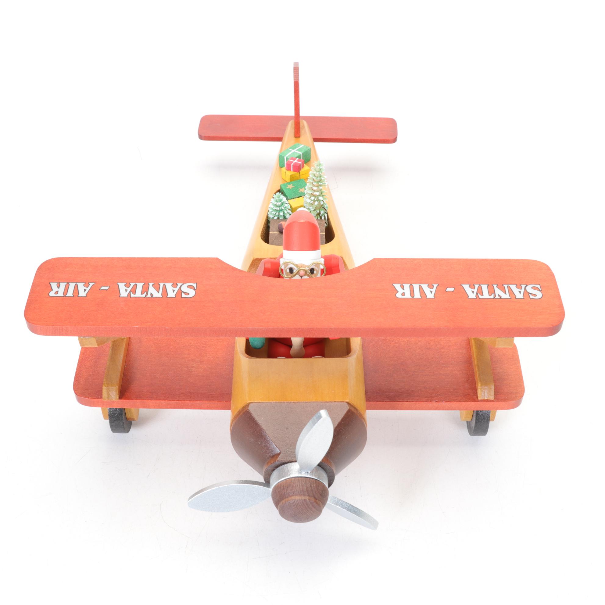 Richard Glasser Erzgebirgische German Carved Wood Santa in Biplane Figurine