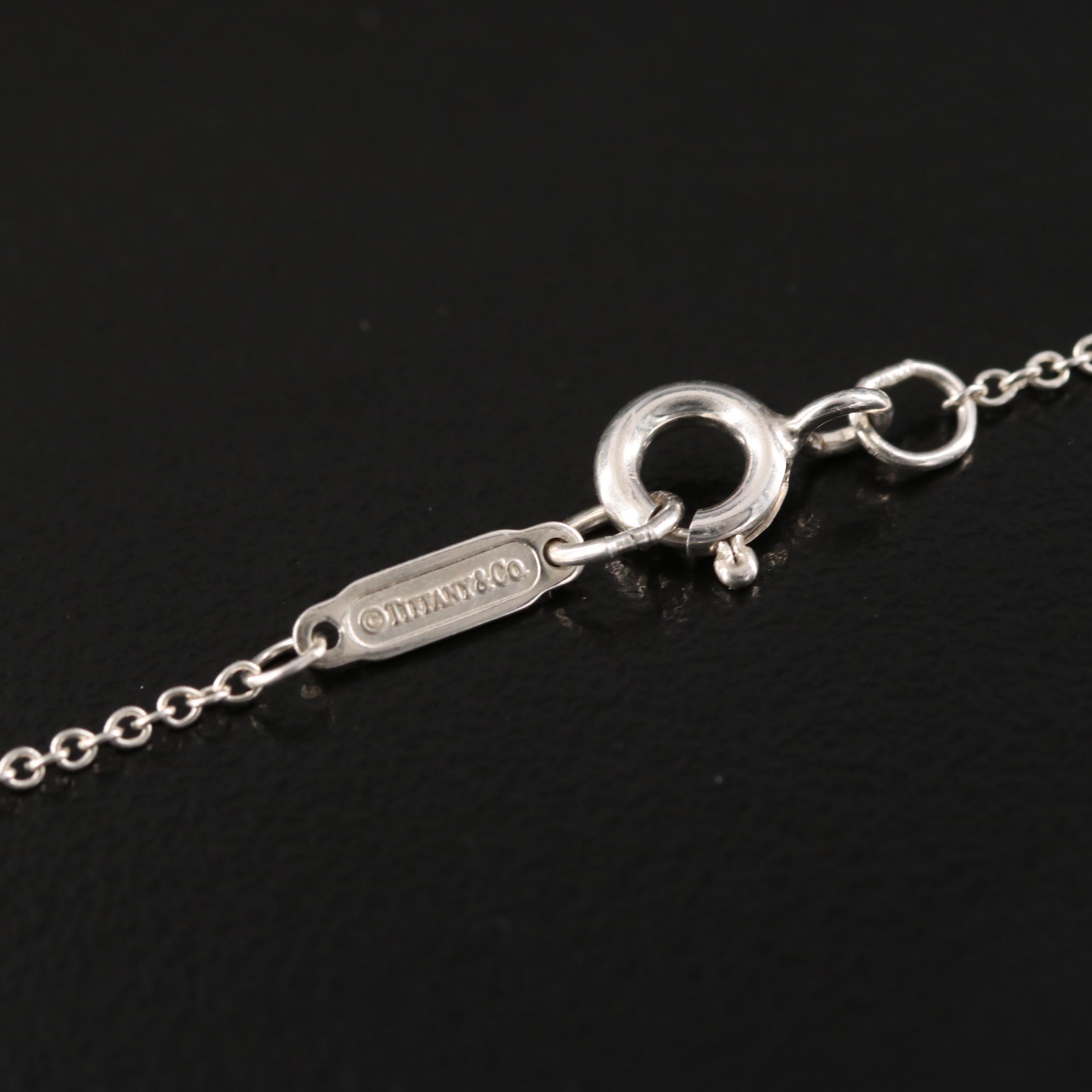 Tiffany & Co. Sterling Peace Sign Necklace