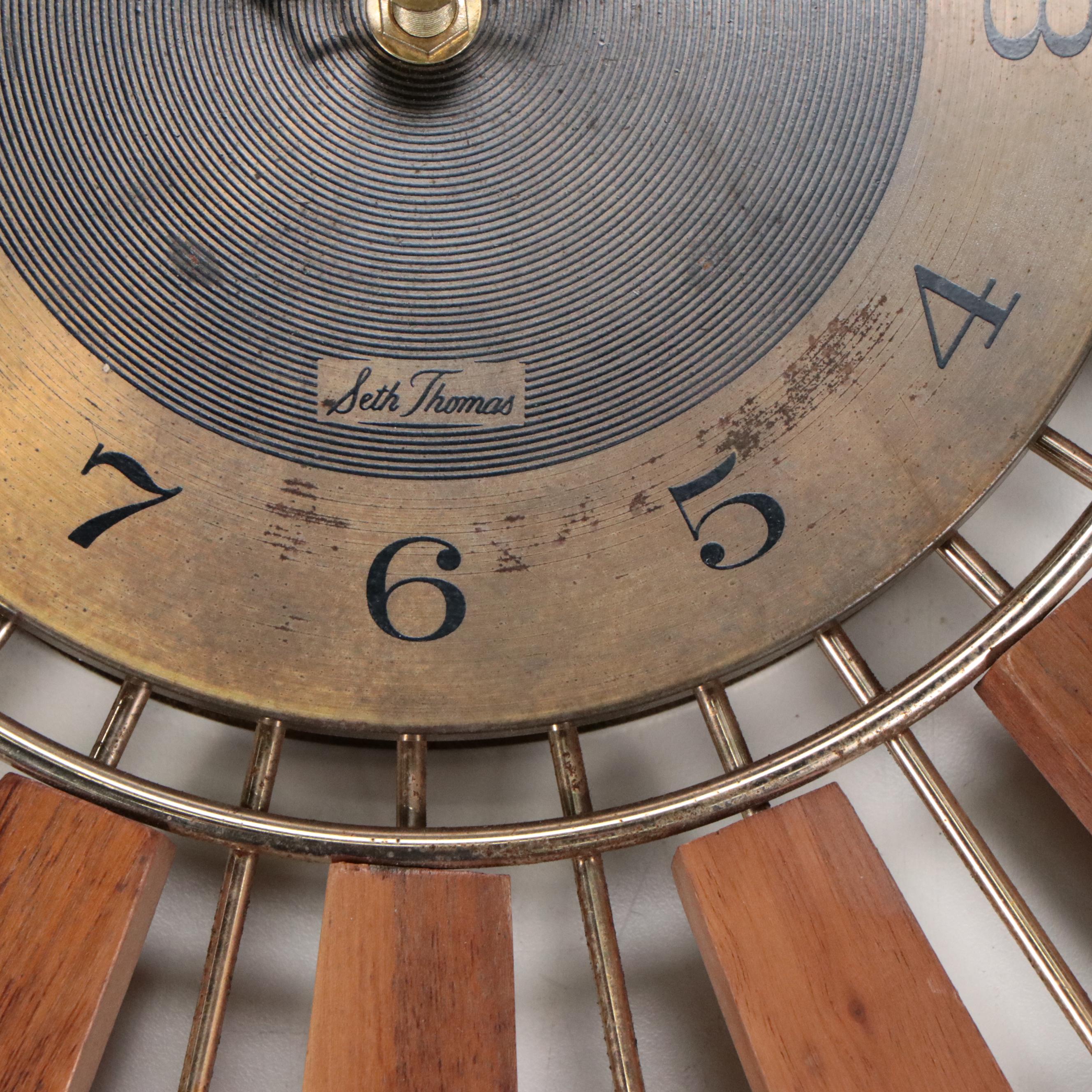 Seth Thomas "Grandeur" Teak and Brass Starburst Wall Clock