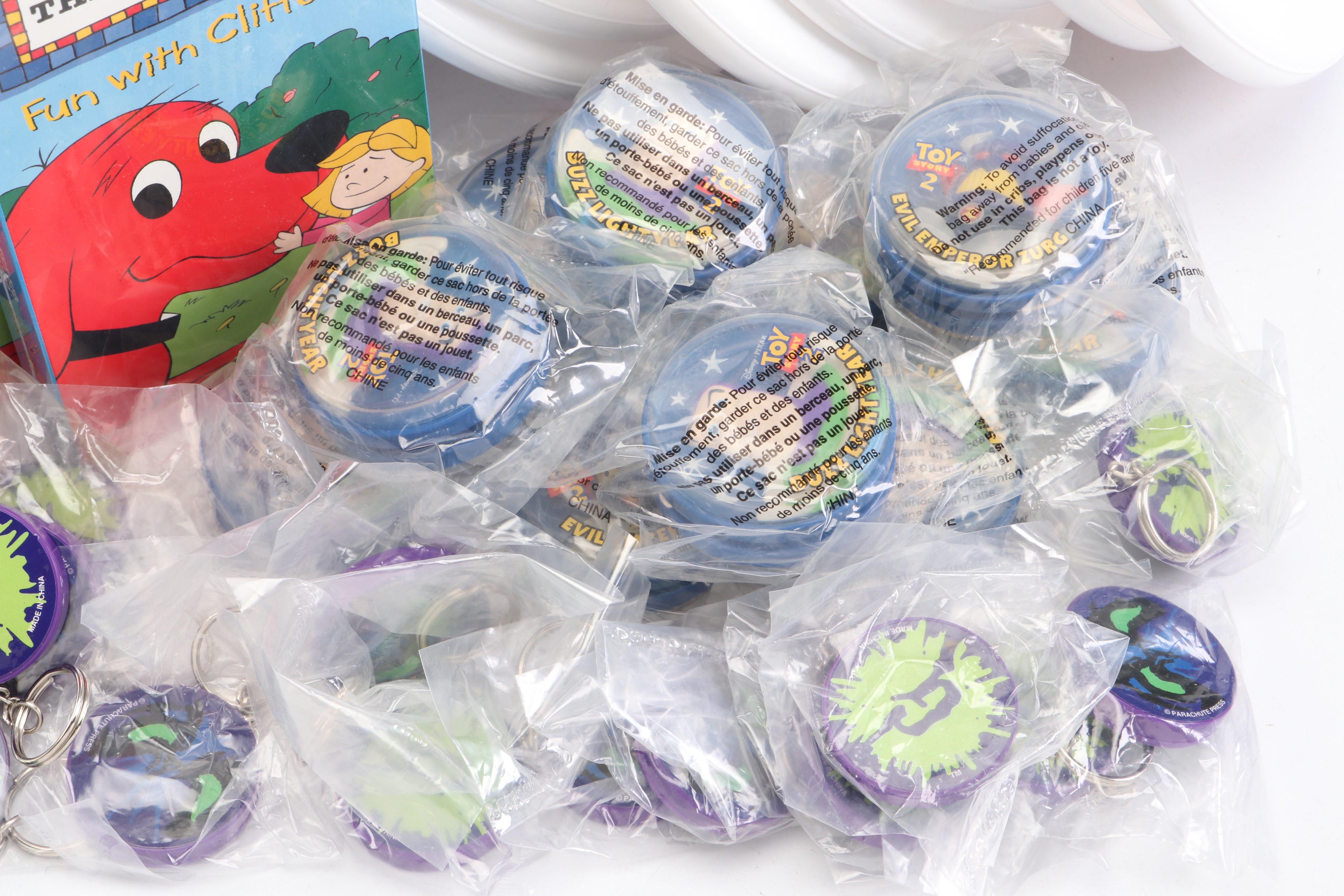 Daffy Duck and Pepé Le Pew Stuffed Toys with Yo-Yos, VHS Tapes, and Frisbees