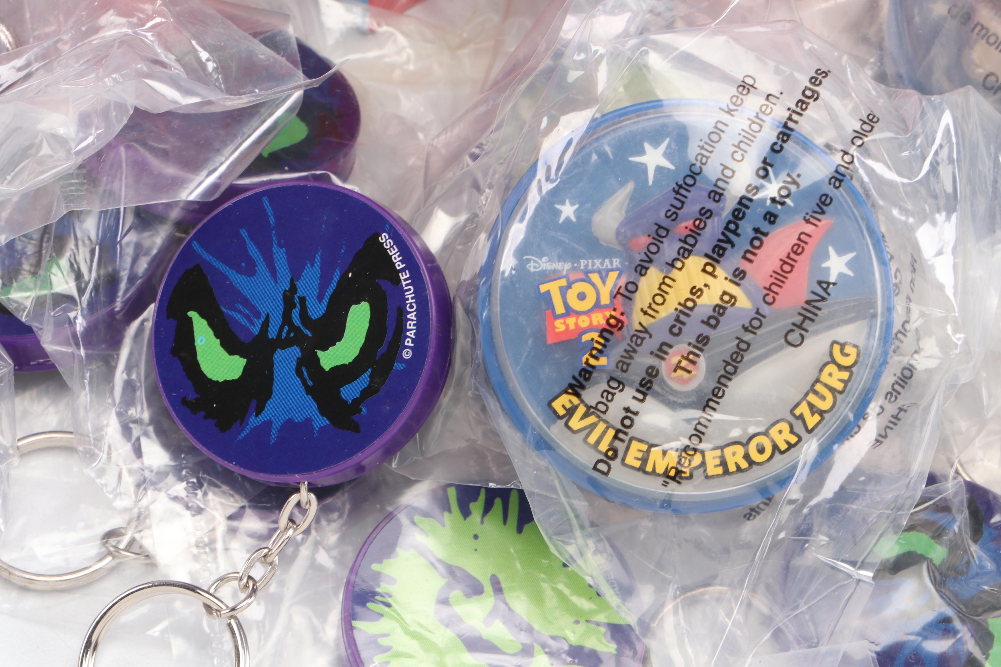 Daffy Duck and Pepé Le Pew Stuffed Toys with Yo-Yos, VHS Tapes, and Frisbees