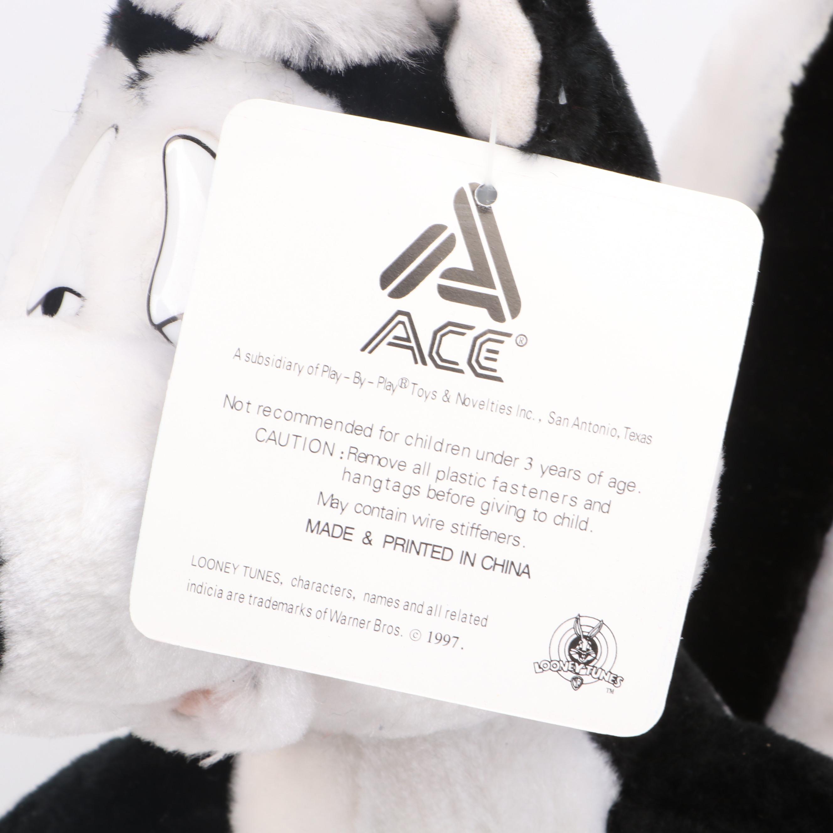 Daffy Duck and Pepé Le Pew Stuffed Toys with Yo-Yos, VHS Tapes, and Frisbees