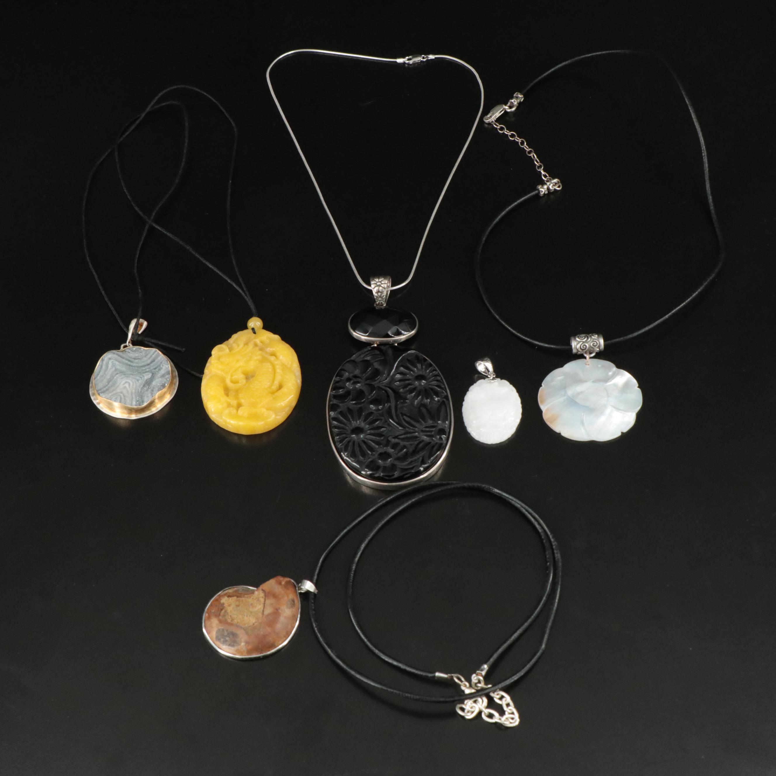 Necklace Collection Featuring Mother of Pearl, Ammonite, and Sterling