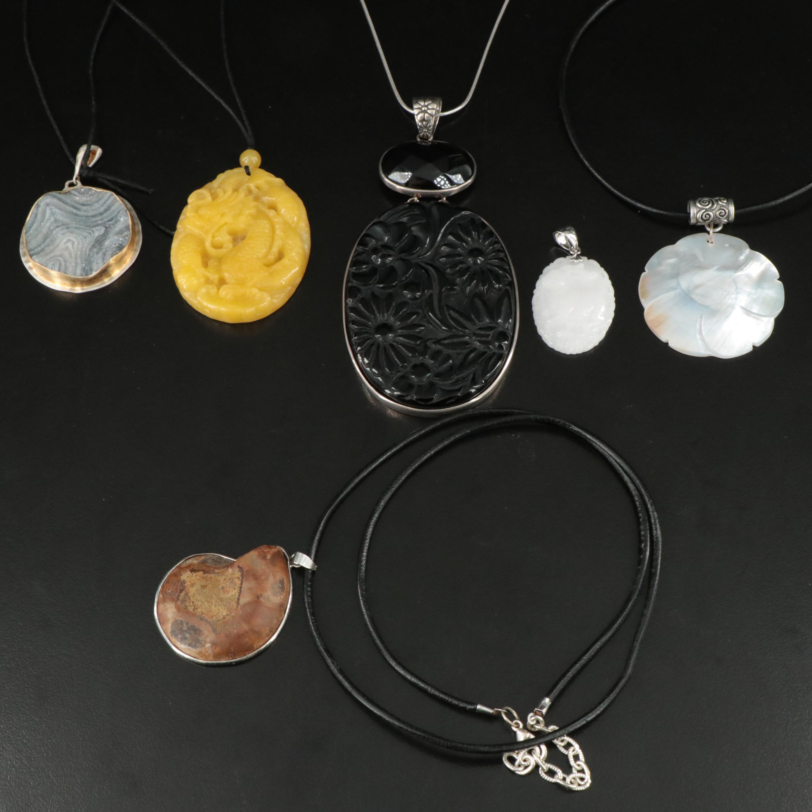Necklace Collection Featuring Mother of Pearl, Ammonite, and Sterling