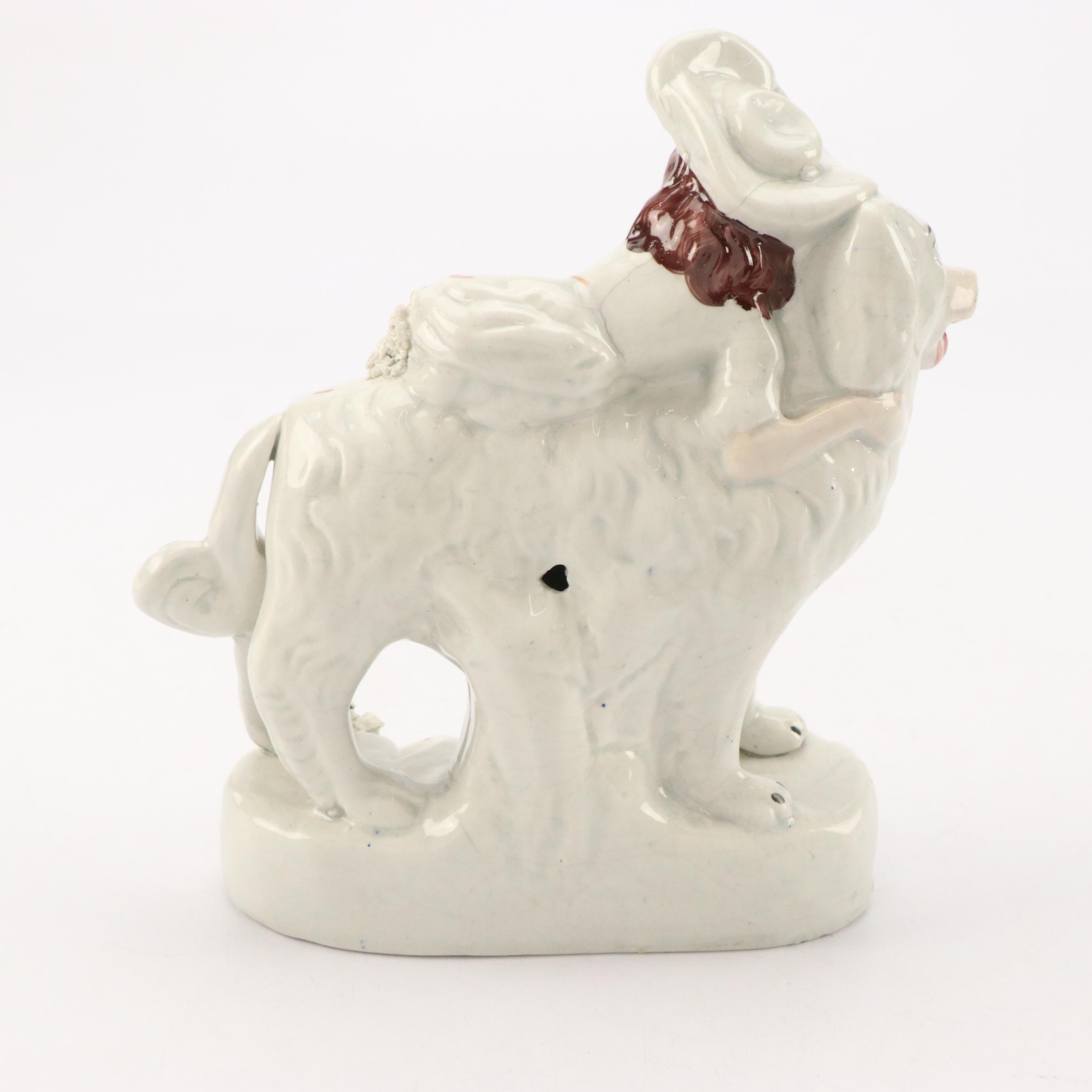 Staffordshire Earthenware Gilt Accented Girl with Dog  Figurine, 19th Century