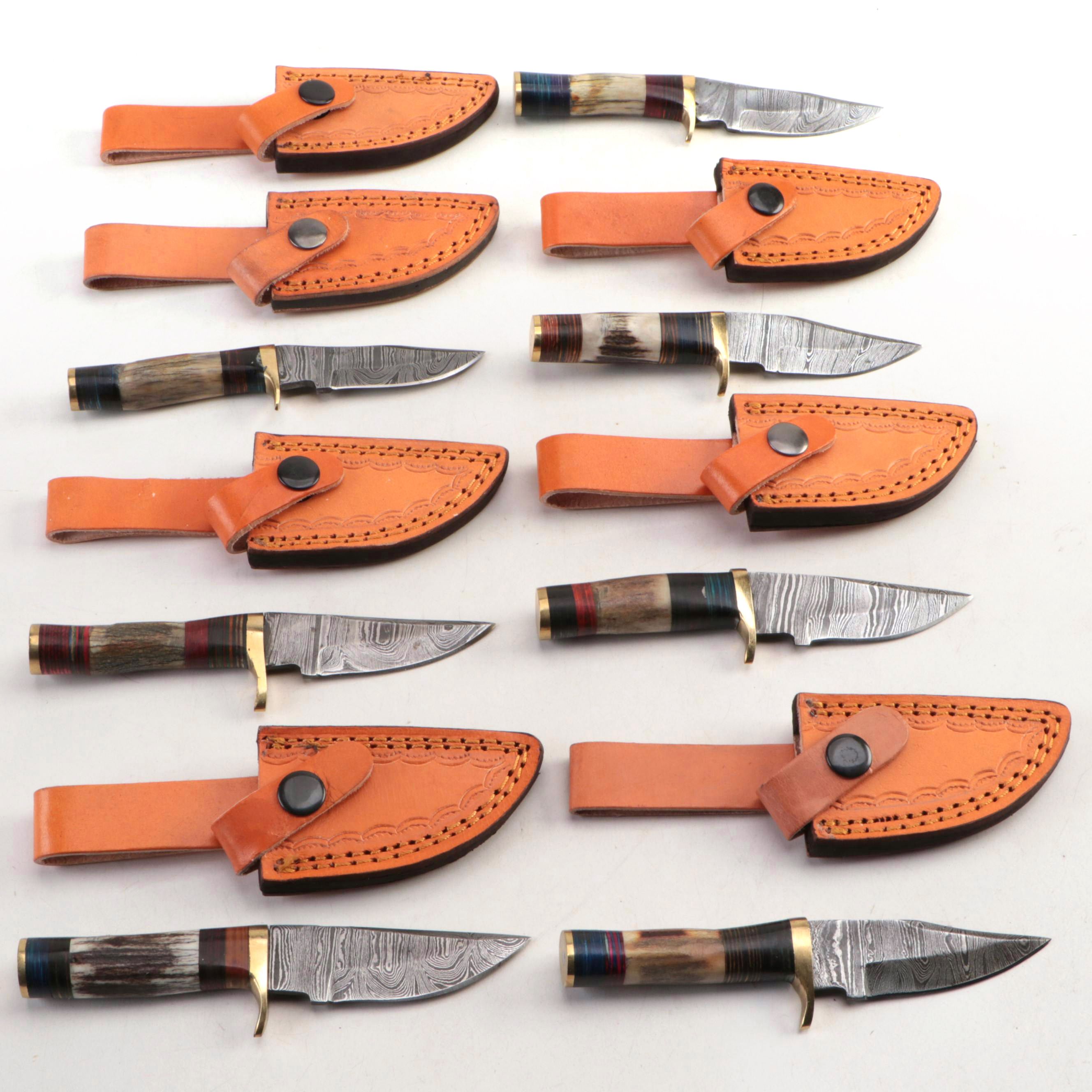 Damascus Steel and Antler Handled Skinner Knives with Leather Scabbards