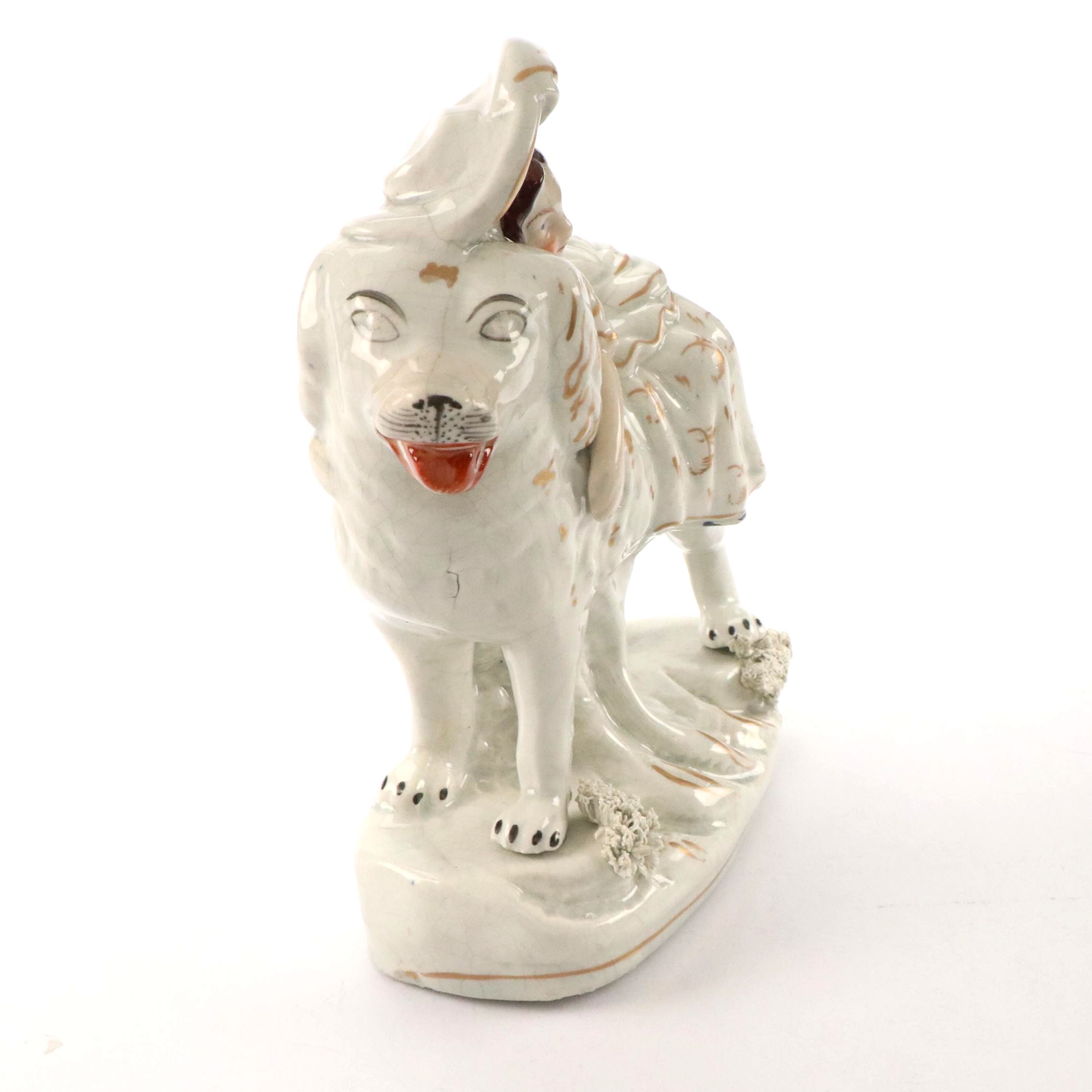 Staffordshire Earthenware Gilt Accented Girl with Dog  Figurine, 19th Century