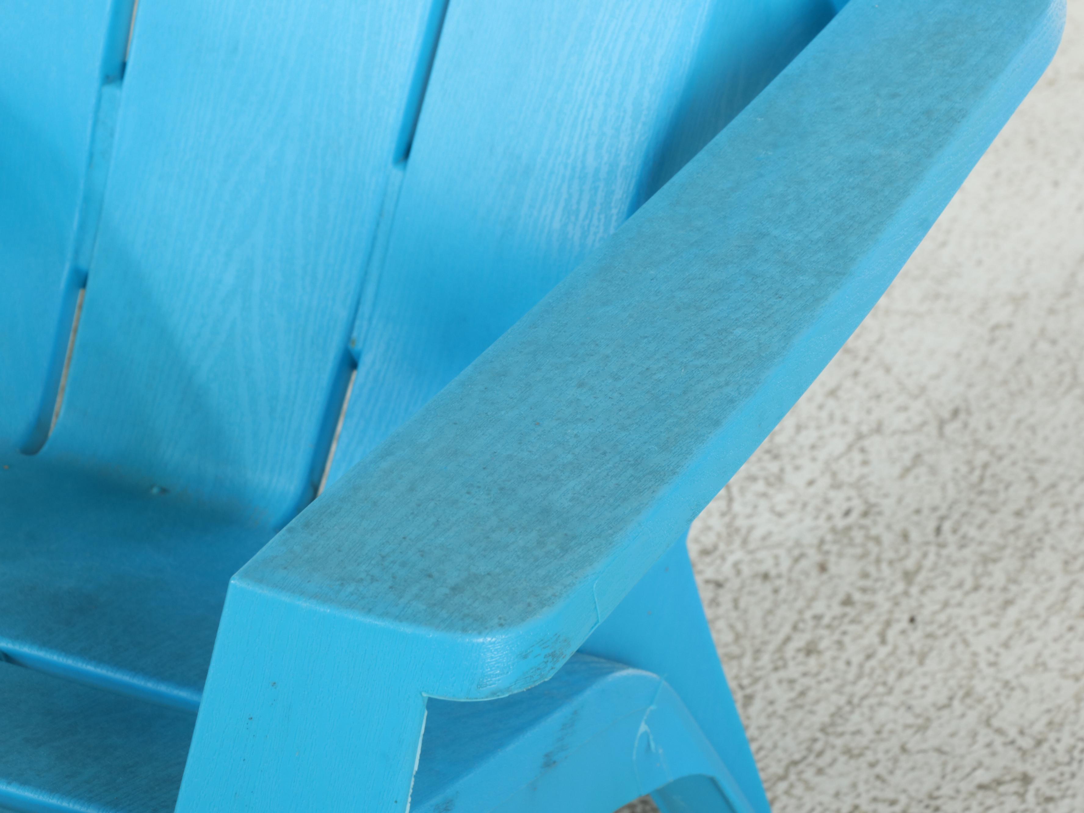 Four Molded Plastic Adirondack Style Patio Chairs