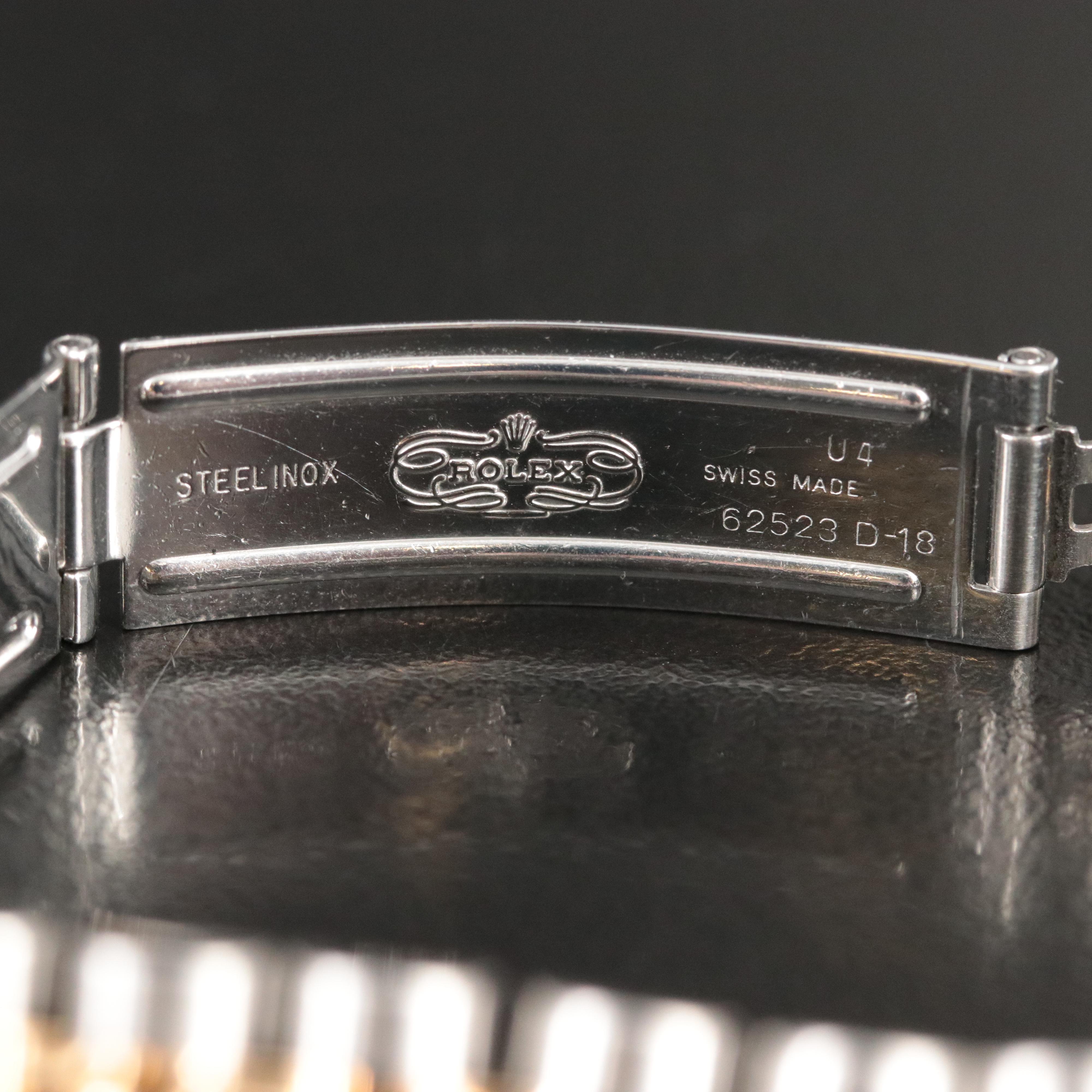 1998 Rolex Ivory Pyramid Roman Dial Datejust 69173 Watch