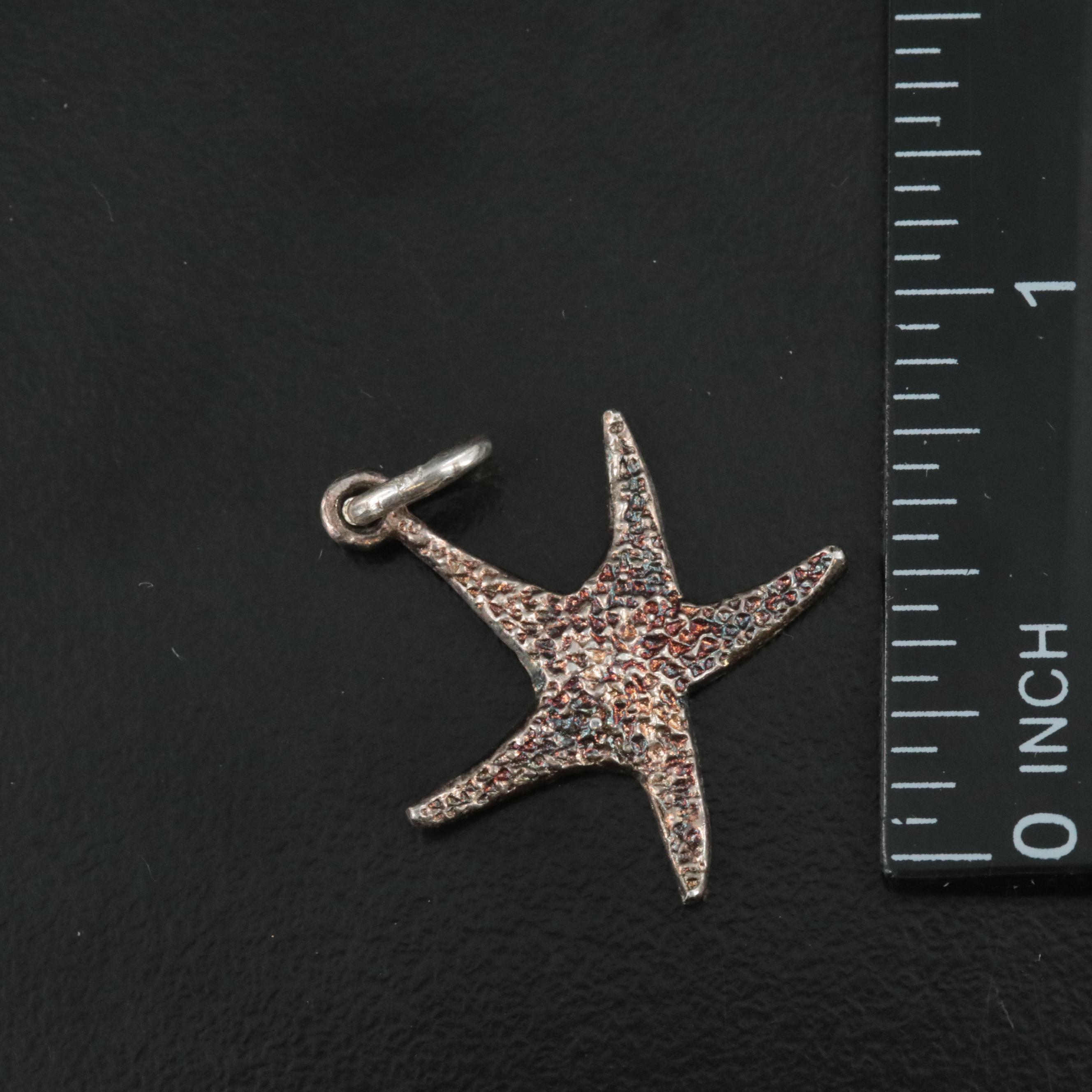 Sterling Charm Bracelet with Attached and Unattached Charms Featuring 14K