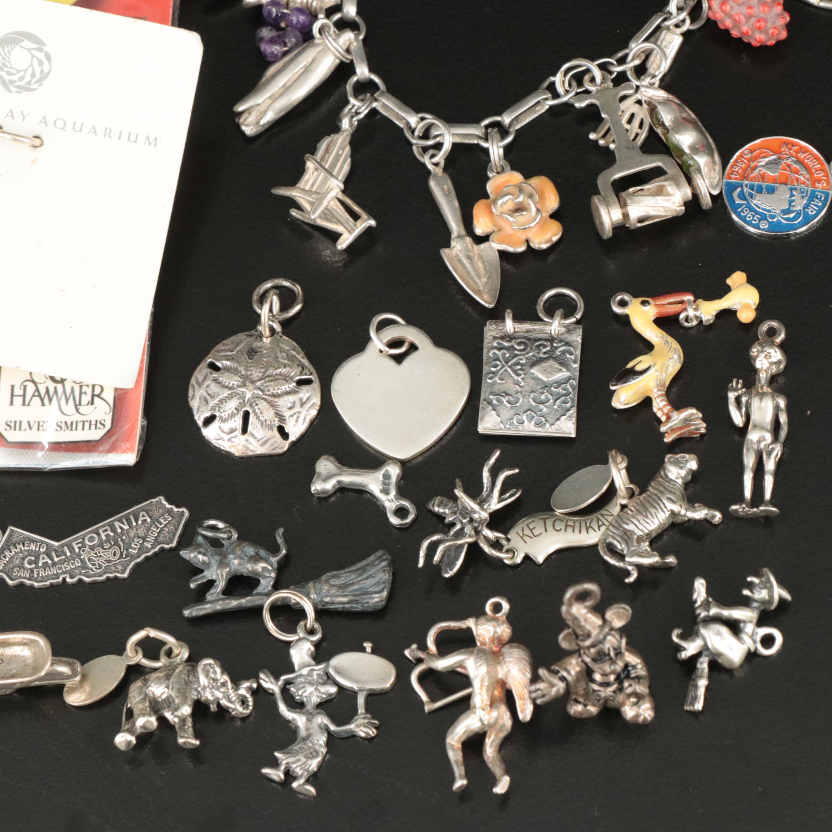 Sterling Charm Bracelet with Attached and Unattached Charms Featuring 14K