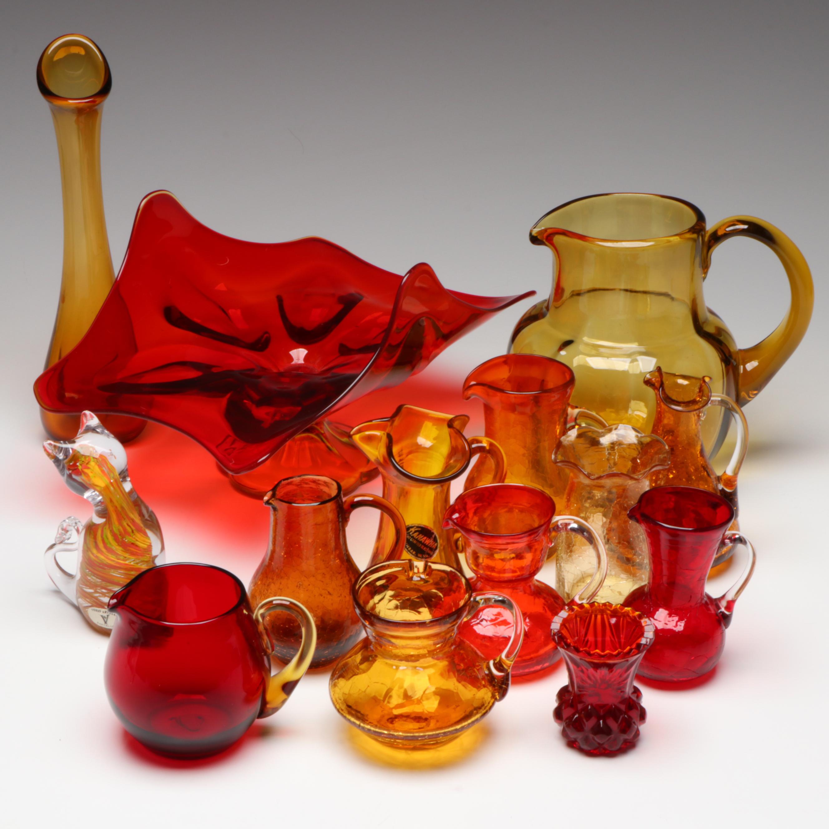 Pilgrim Crackle Glass Pitcher with Other Red and Amber Glass Decor