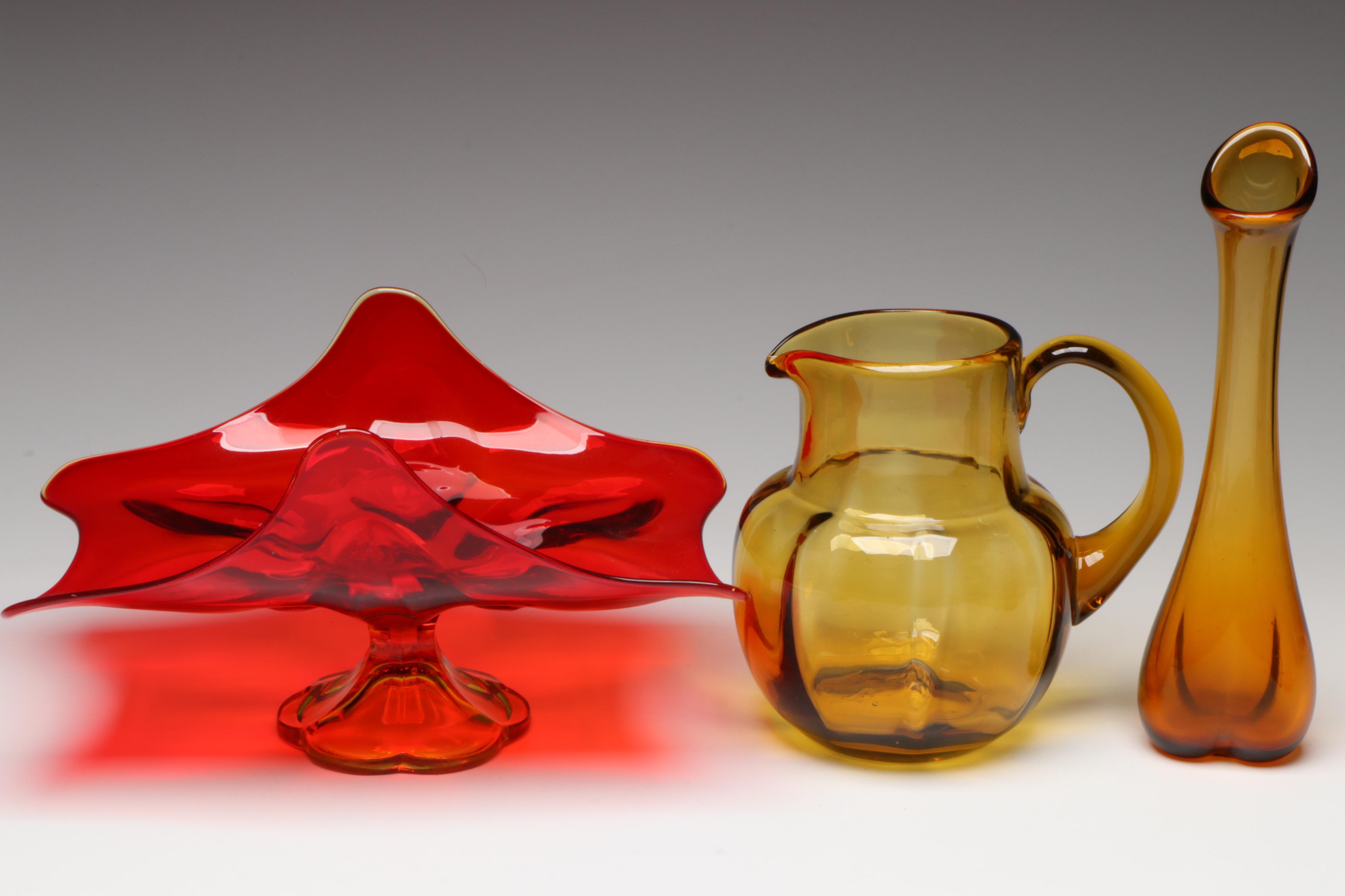 Pilgrim Crackle Glass Pitcher with Other Red and Amber Glass Decor
