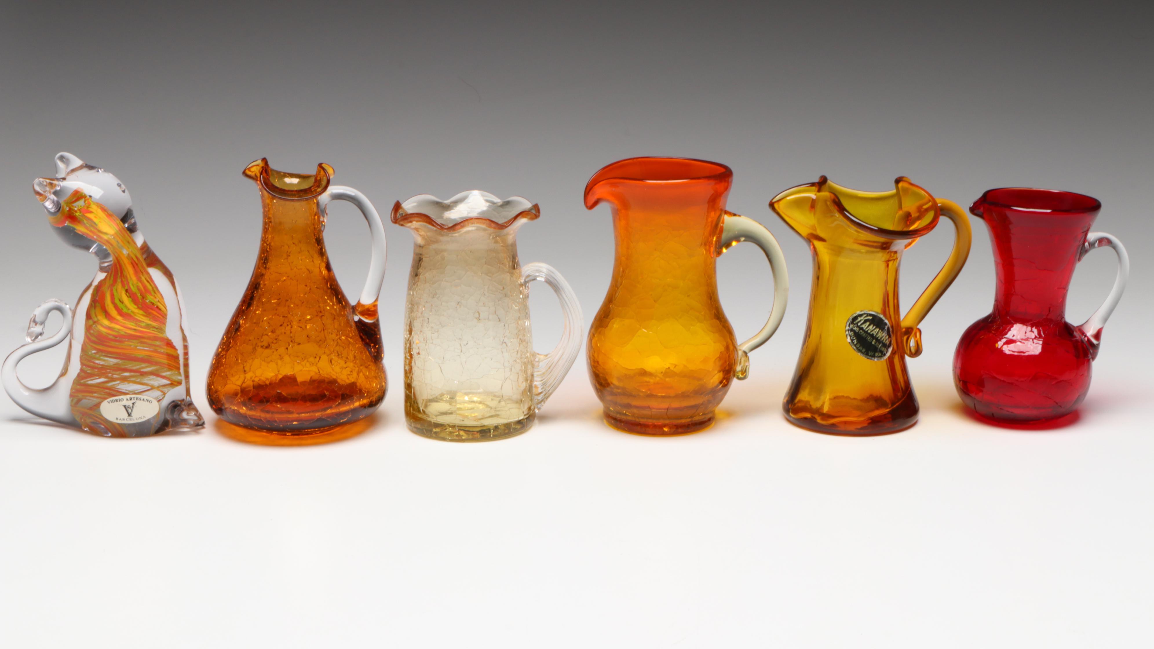 Pilgrim Crackle Glass Pitcher with Other Red and Amber Glass Decor