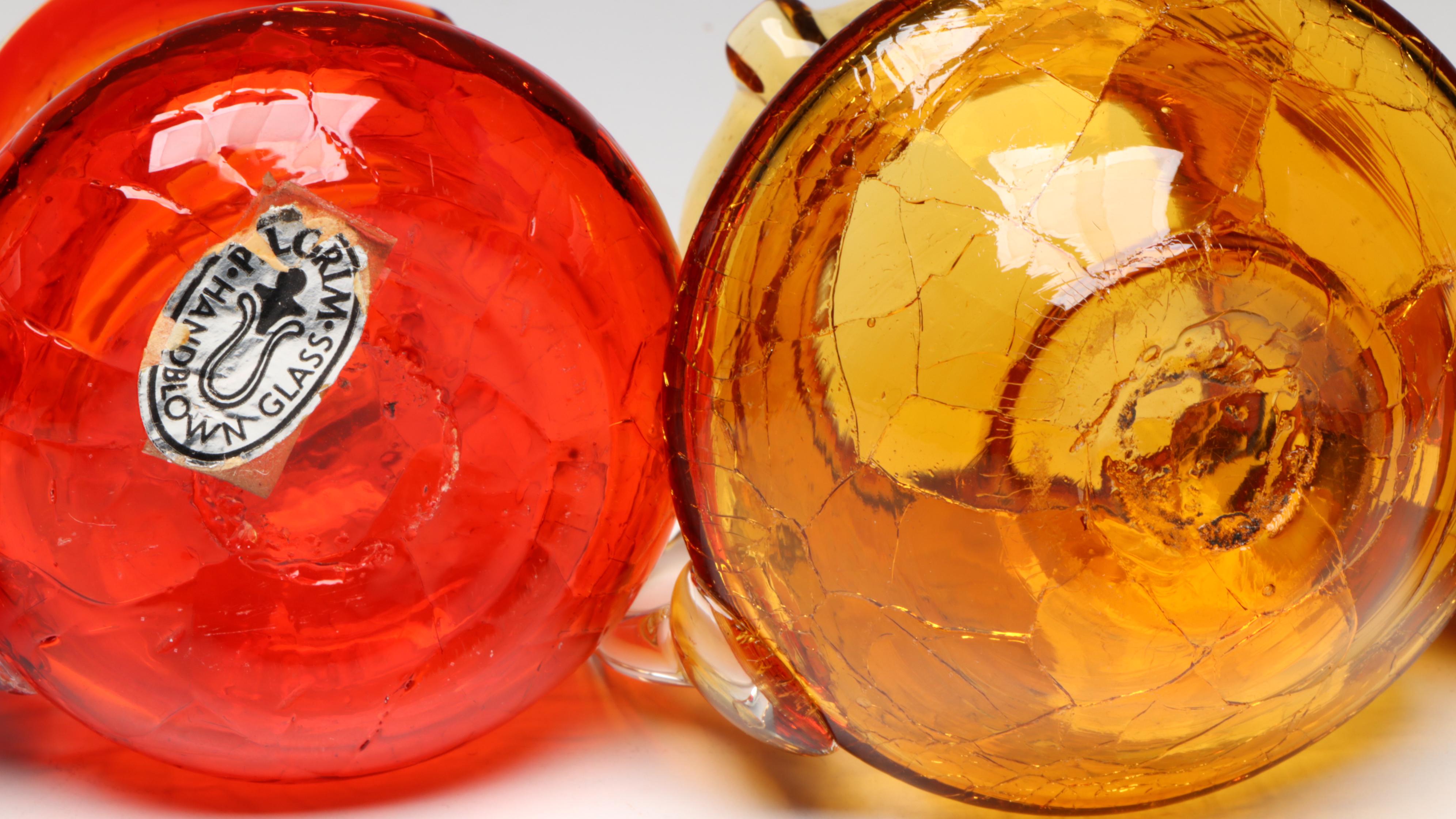 Pilgrim Crackle Glass Pitcher with Other Red and Amber Glass Decor