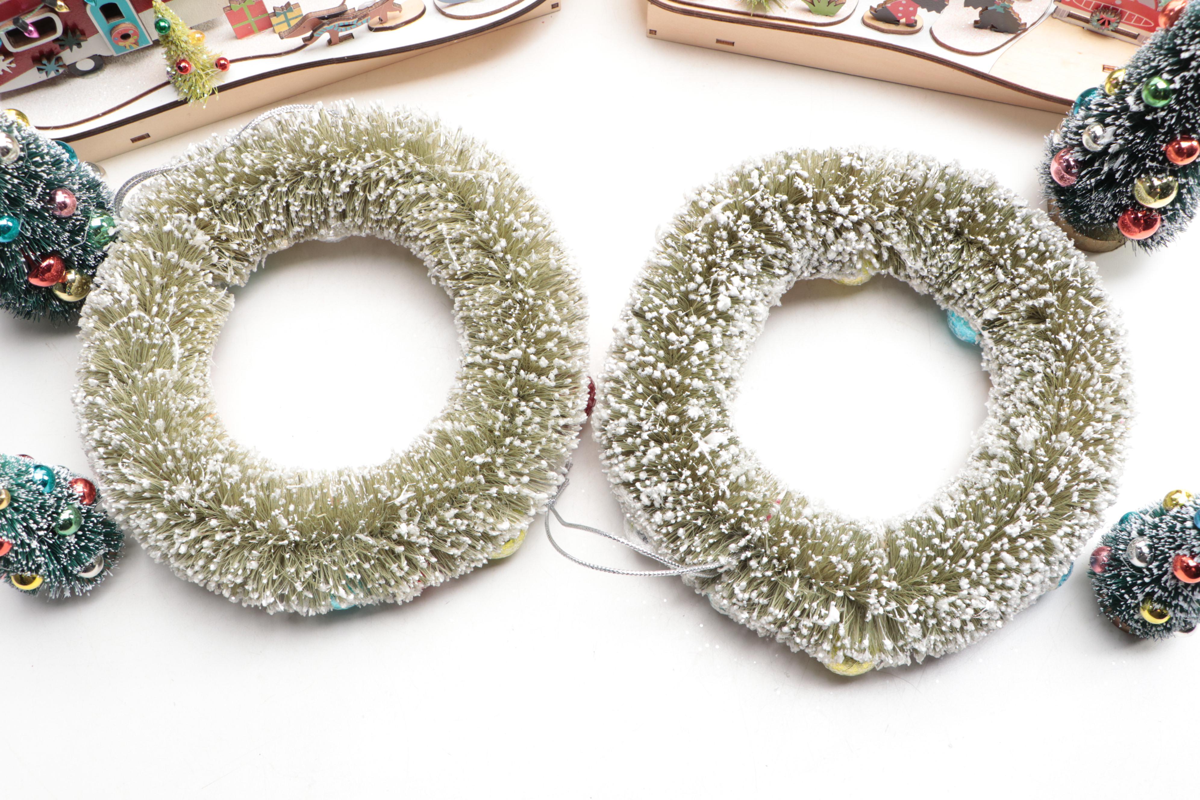 World Market Laser-Cut Wood Christmas Village Décor with Bottlebrush Trees, More