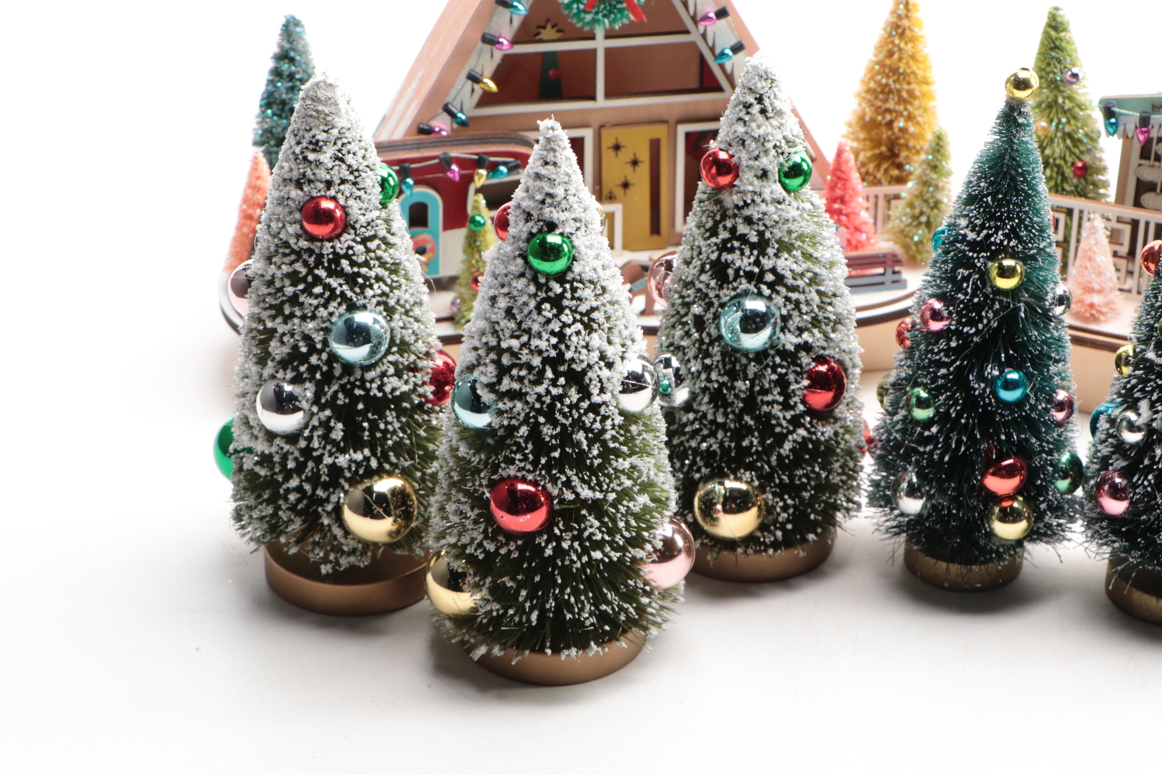 World Market Laser-Cut Wood Christmas Village Décor with Bottlebrush Trees, More
