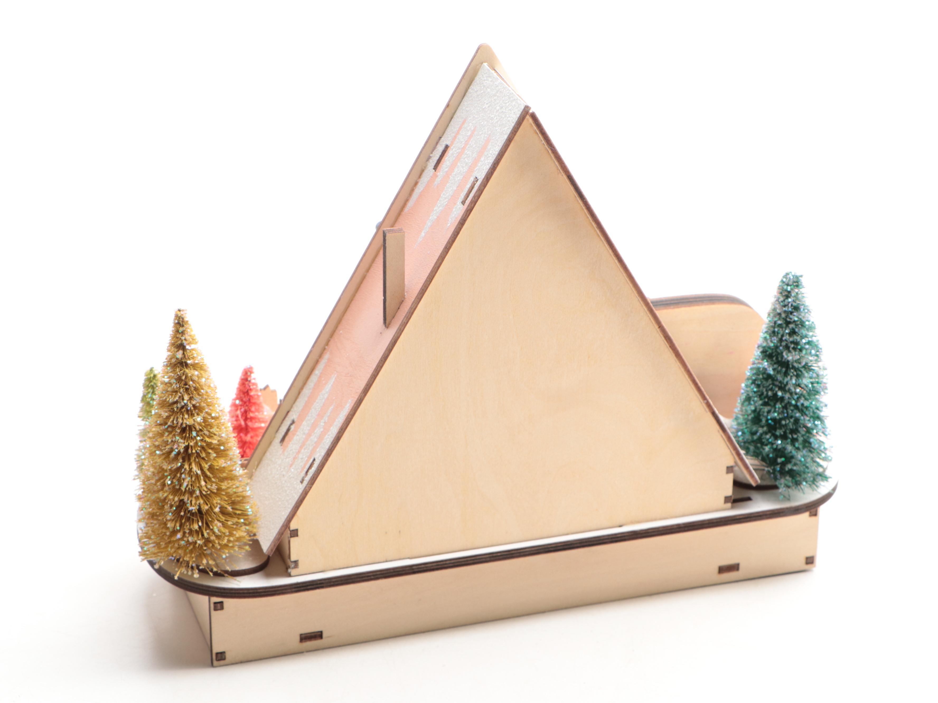 World Market Laser-Cut Wood Christmas Village Décor with Bottlebrush Trees, More