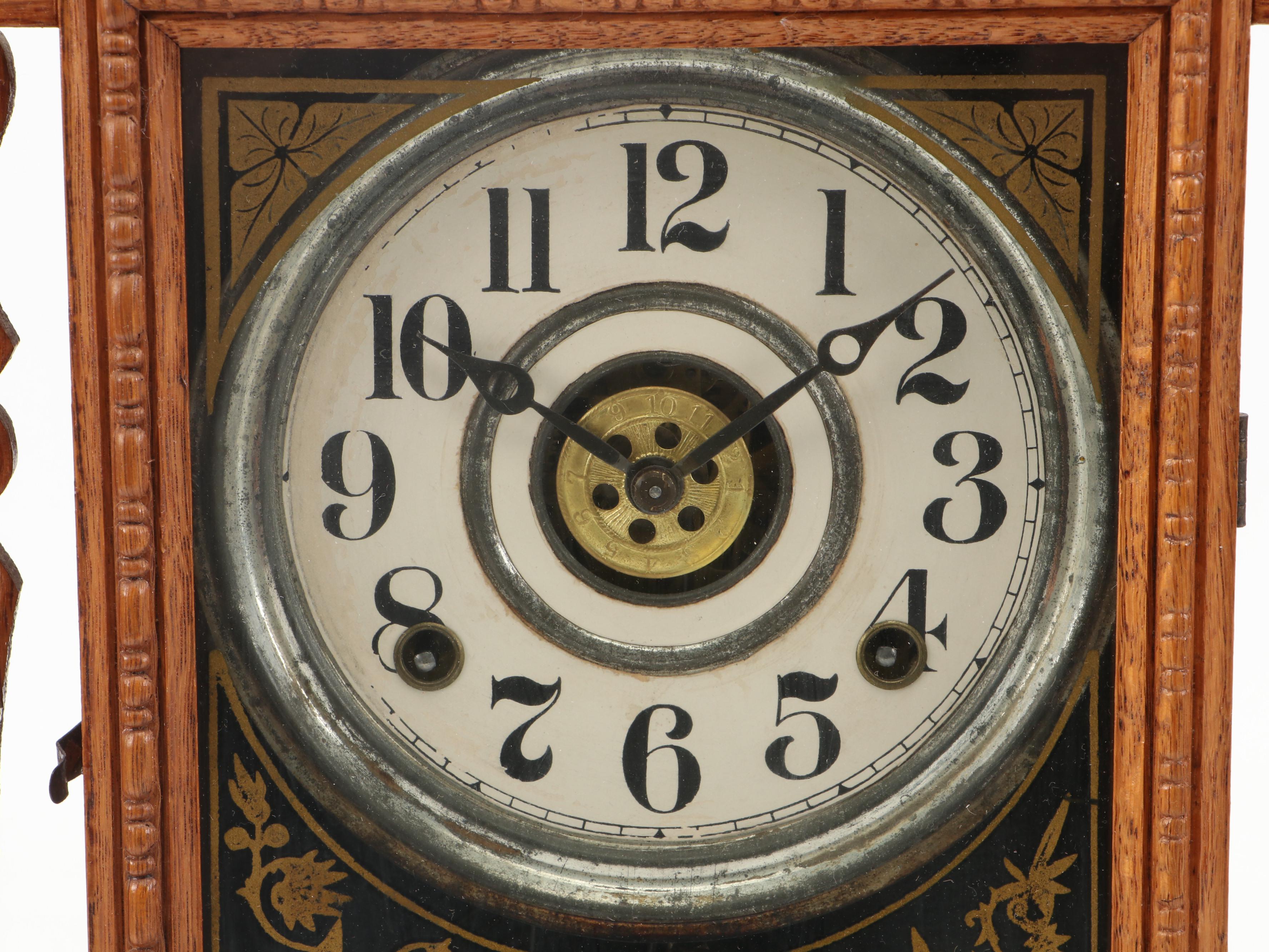 The E. Ingraham Clock Co. "Arctic" Pressed Oak Gingerbread Mantel Clock