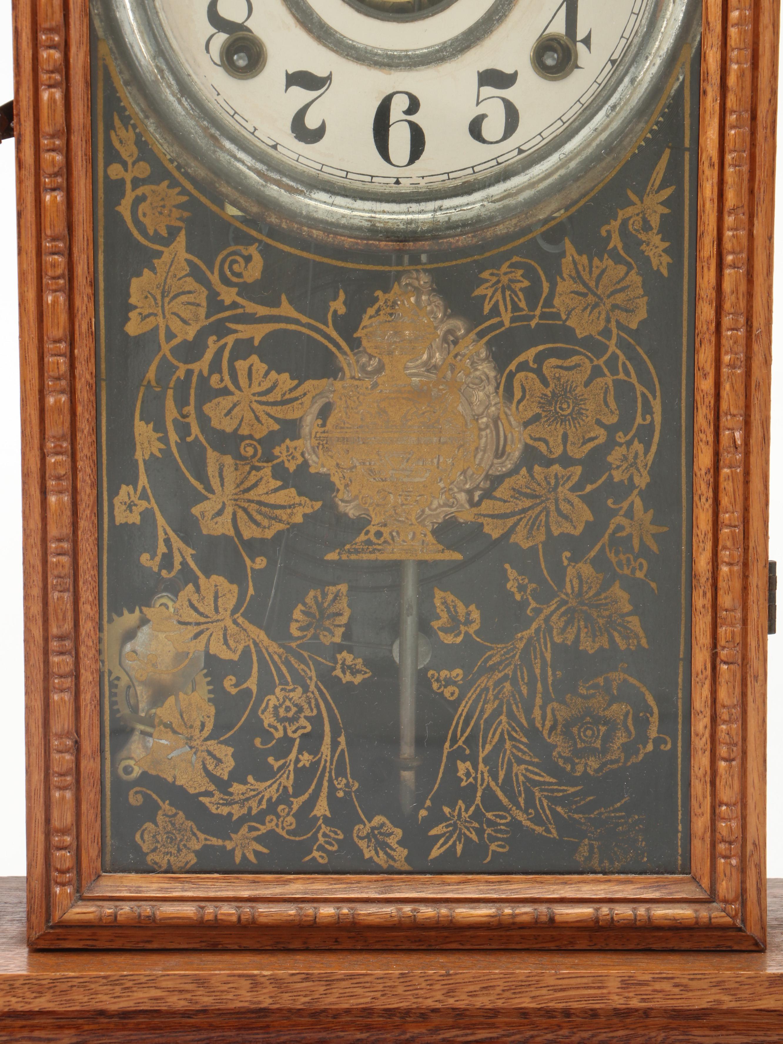 The E. Ingraham Clock Co. "Arctic" Pressed Oak Gingerbread Mantel Clock
