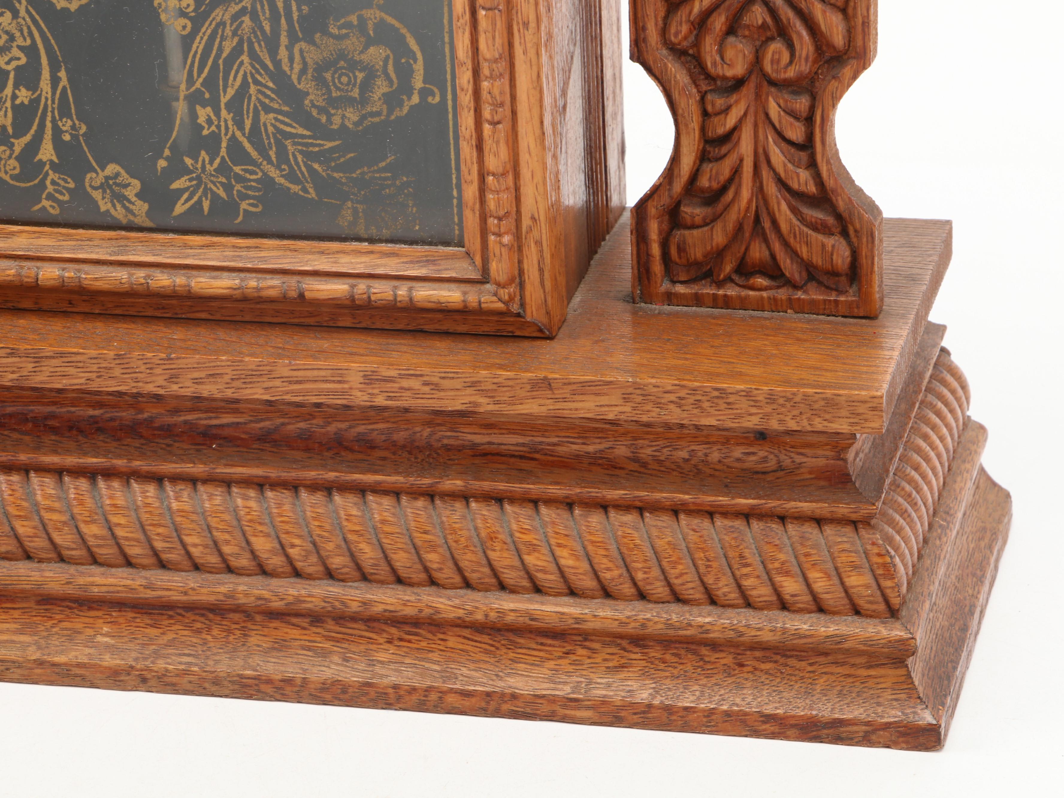 The E. Ingraham Clock Co. "Arctic" Pressed Oak Gingerbread Mantel Clock