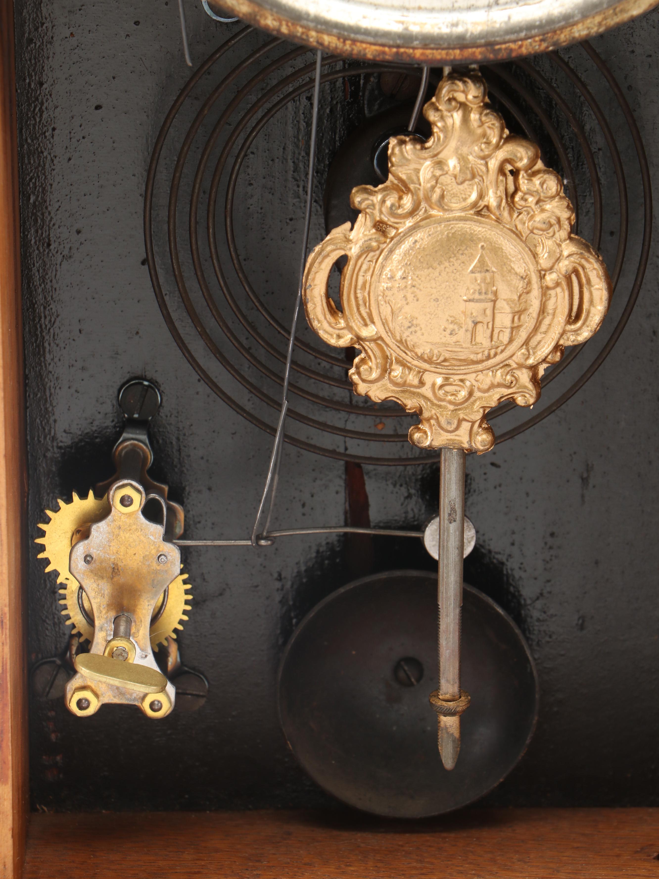 The E. Ingraham Clock Co. "Arctic" Pressed Oak Gingerbread Mantel Clock