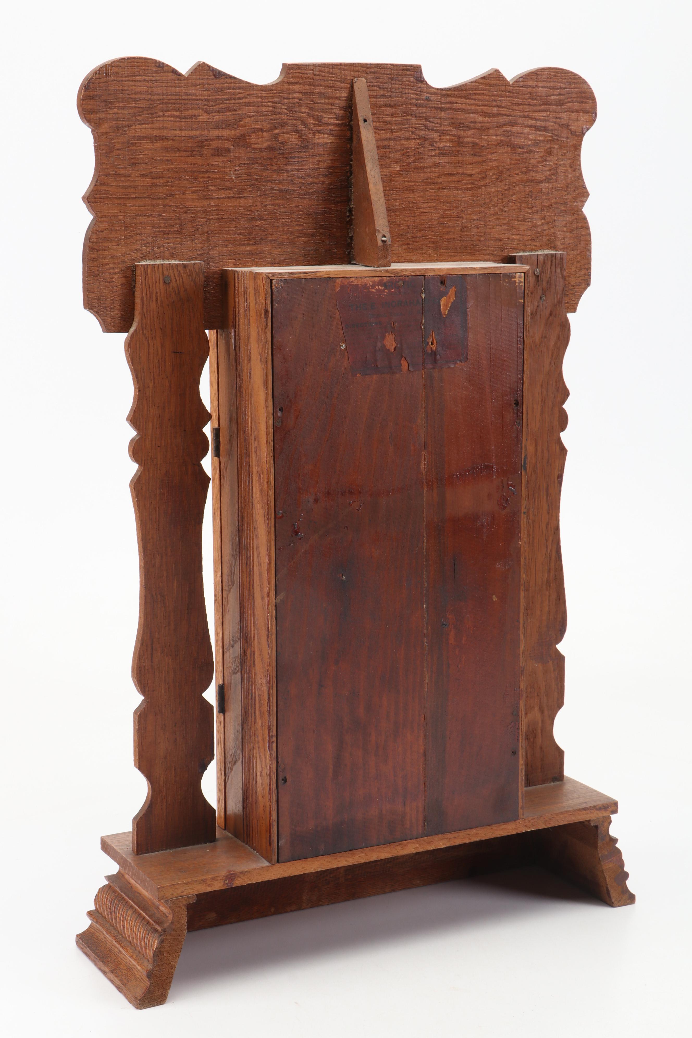 The E. Ingraham Clock Co. "Arctic" Pressed Oak Gingerbread Mantel Clock