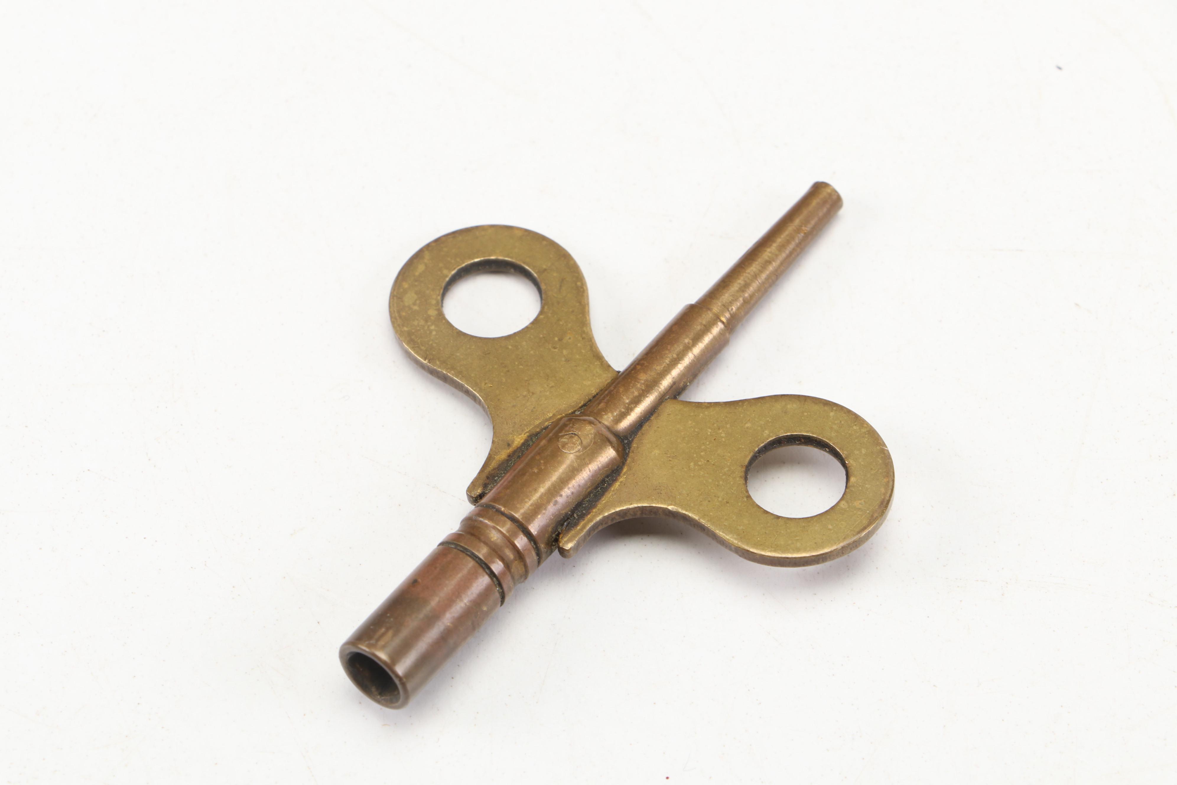 The E. Ingraham Clock Co. "Arctic" Pressed Oak Gingerbread Mantel Clock